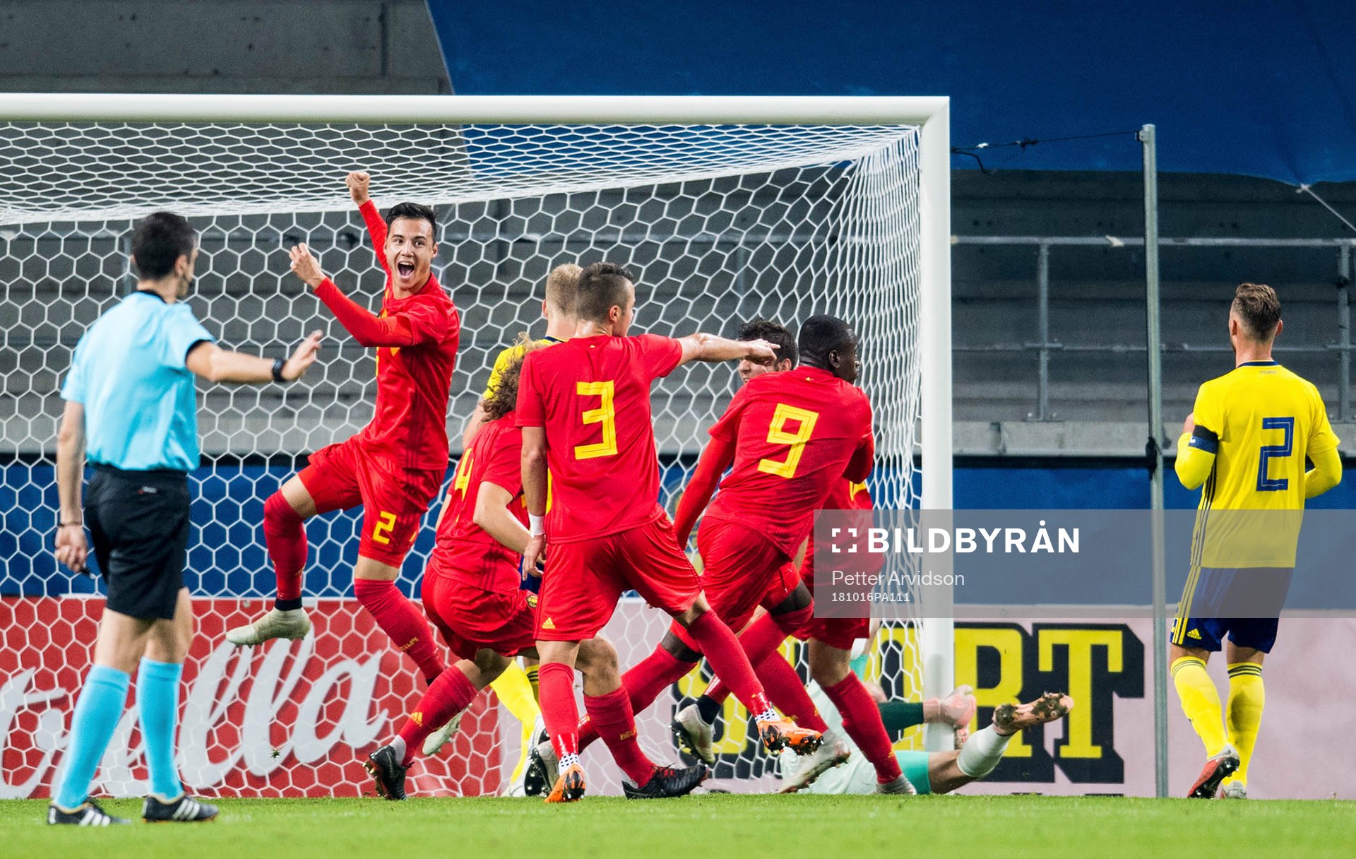 Nany Dimata of Belgium scores the 0-1 goal and celebrates