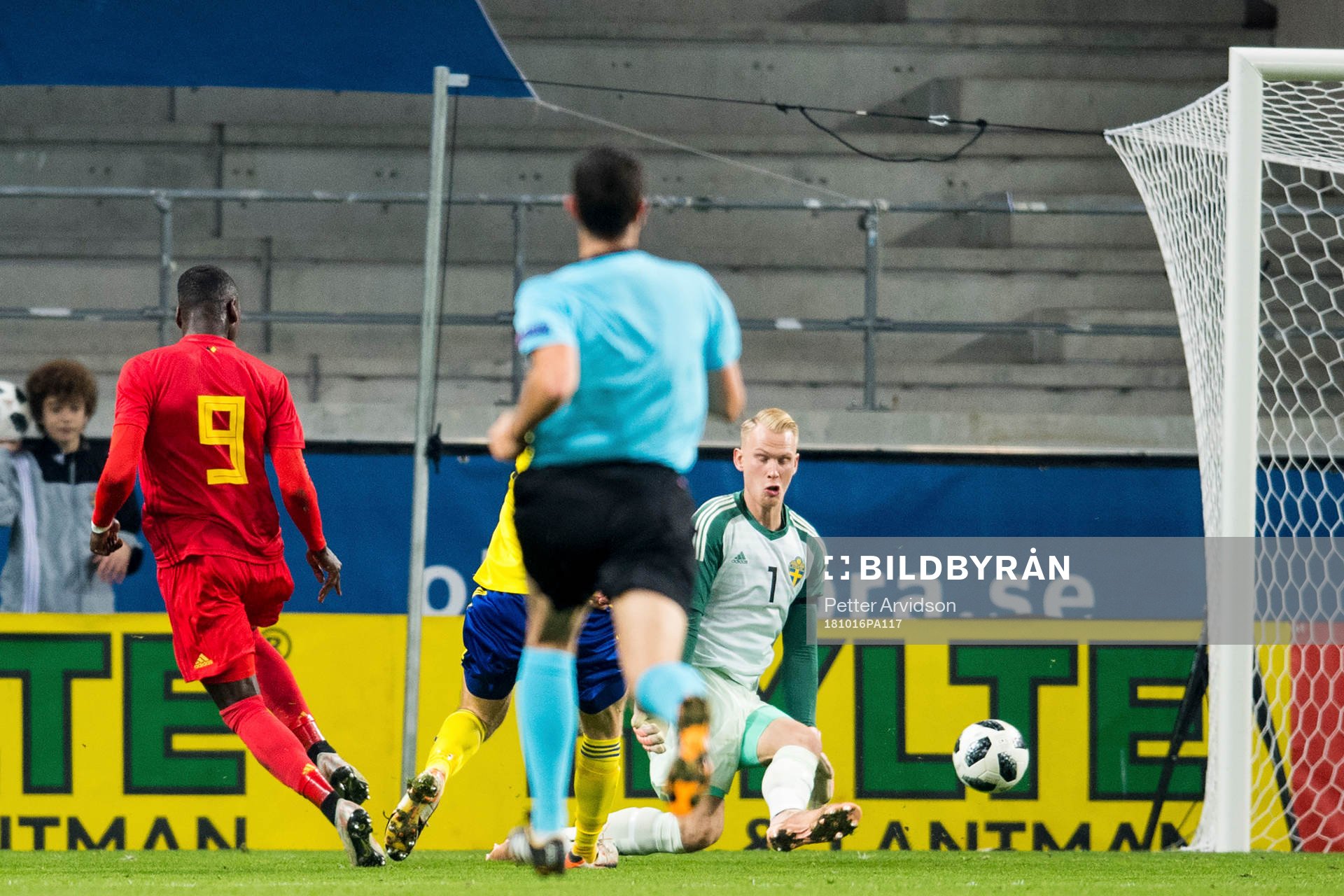 Nany Dimata of Belgium score the 0-2 goal behind goalkeeper