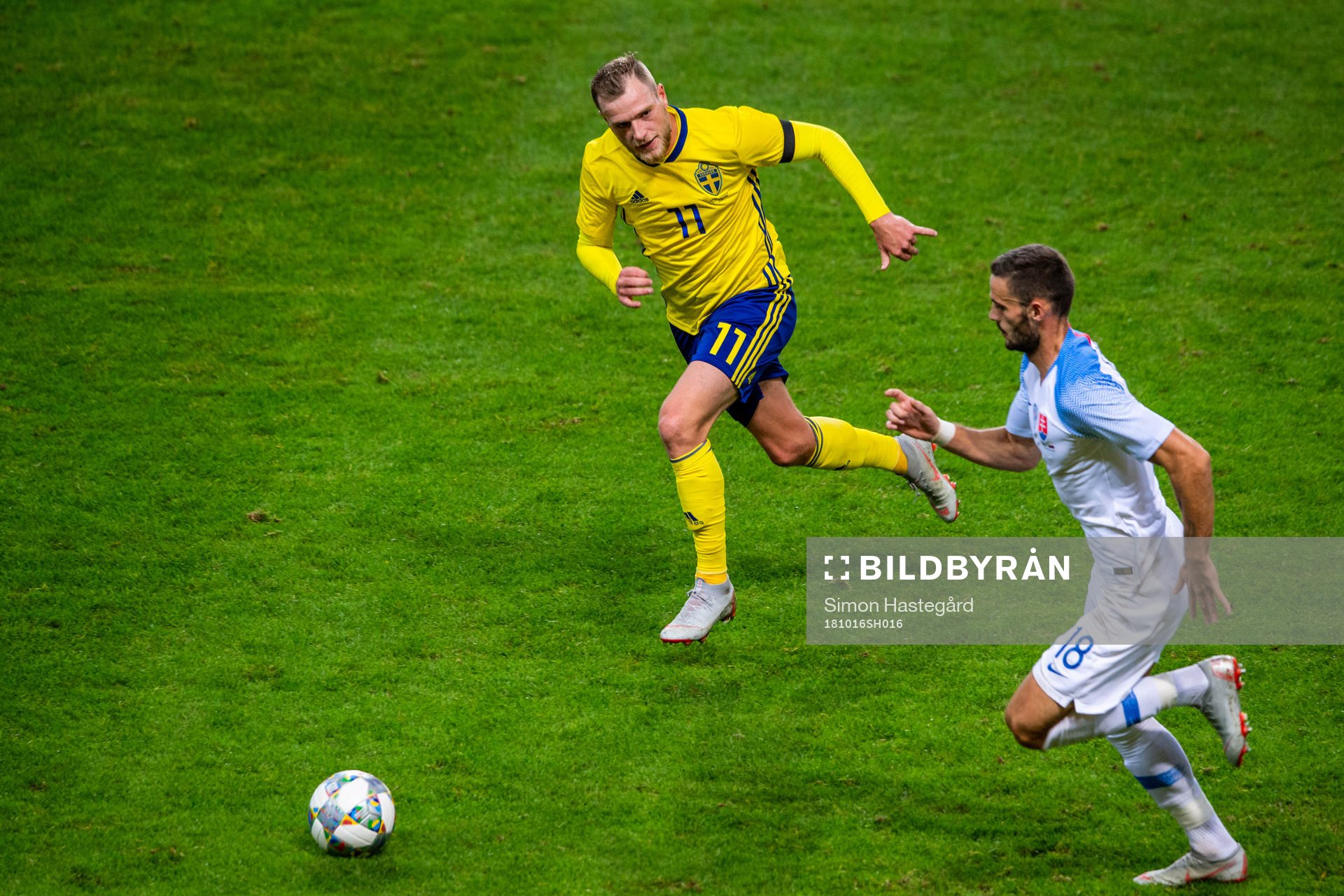 John Guidetti of Sweden and Erik Sabo of Slovakia