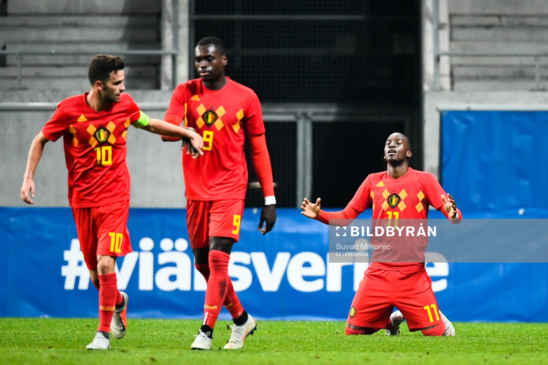 Dodi Lukabakio of Belgium celebrates