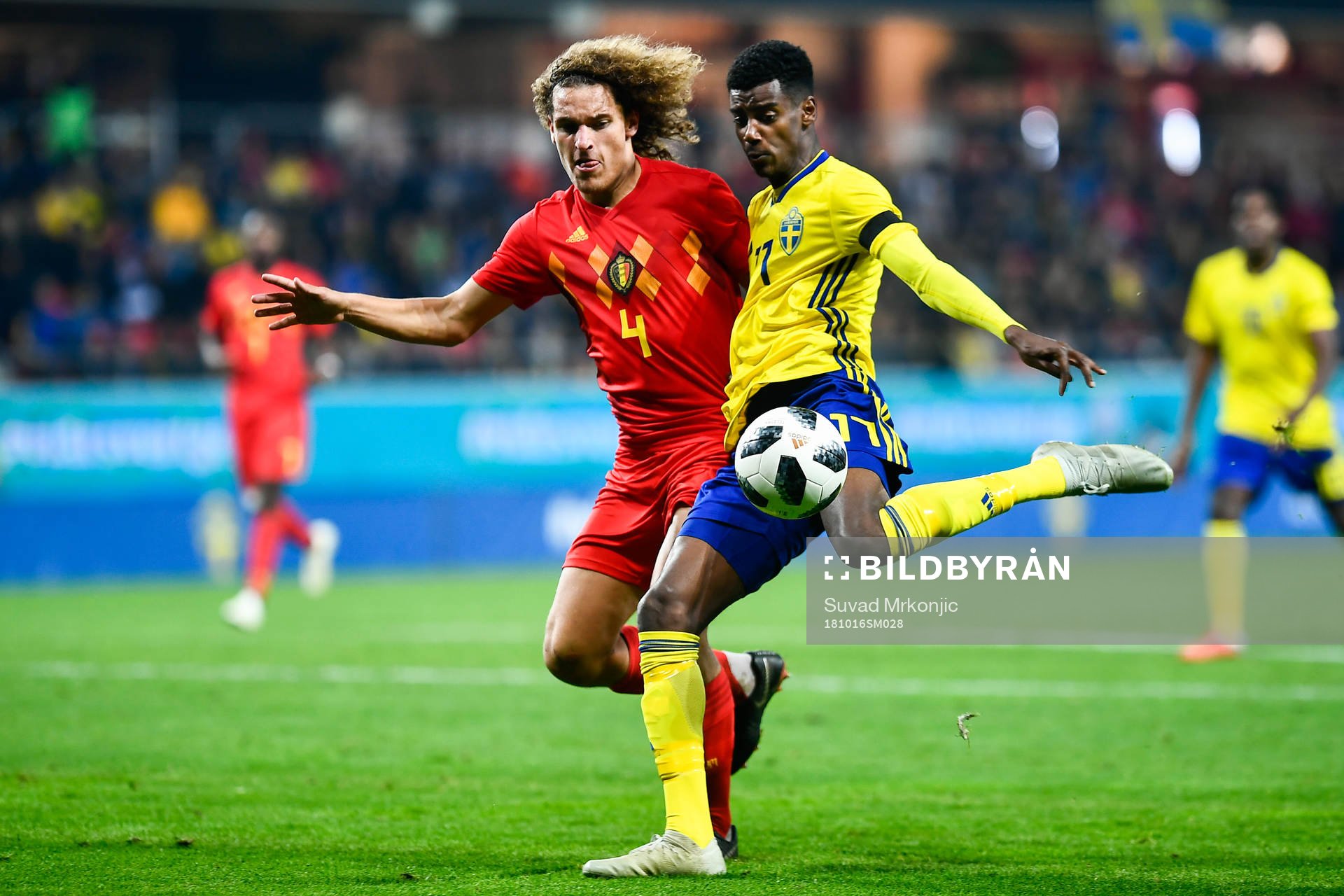 Alexander Isak of Sweden and Wout Faes of Belgium