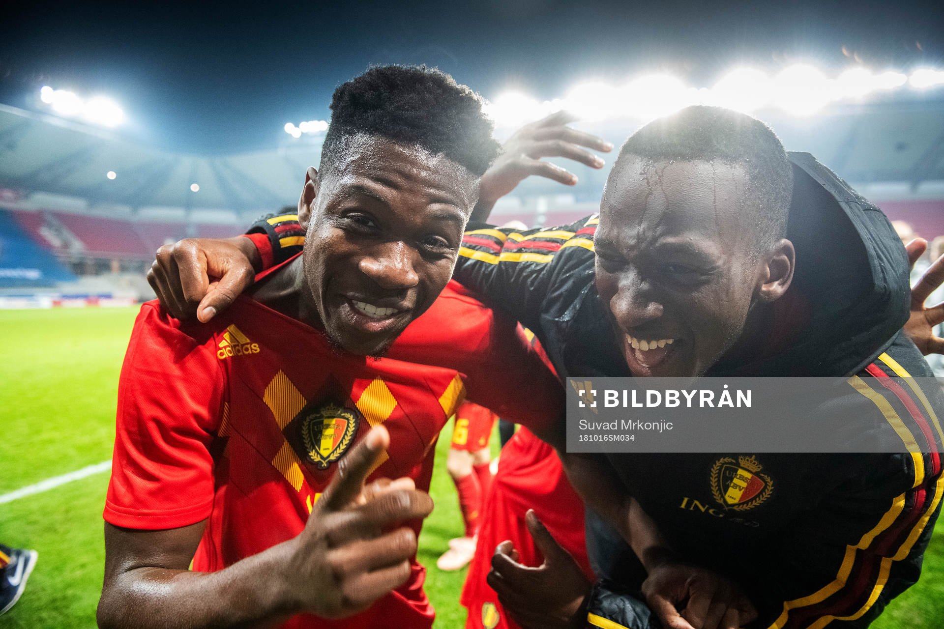 Aaron Leya Iseka and Nany Dimata of Belgium celebrates