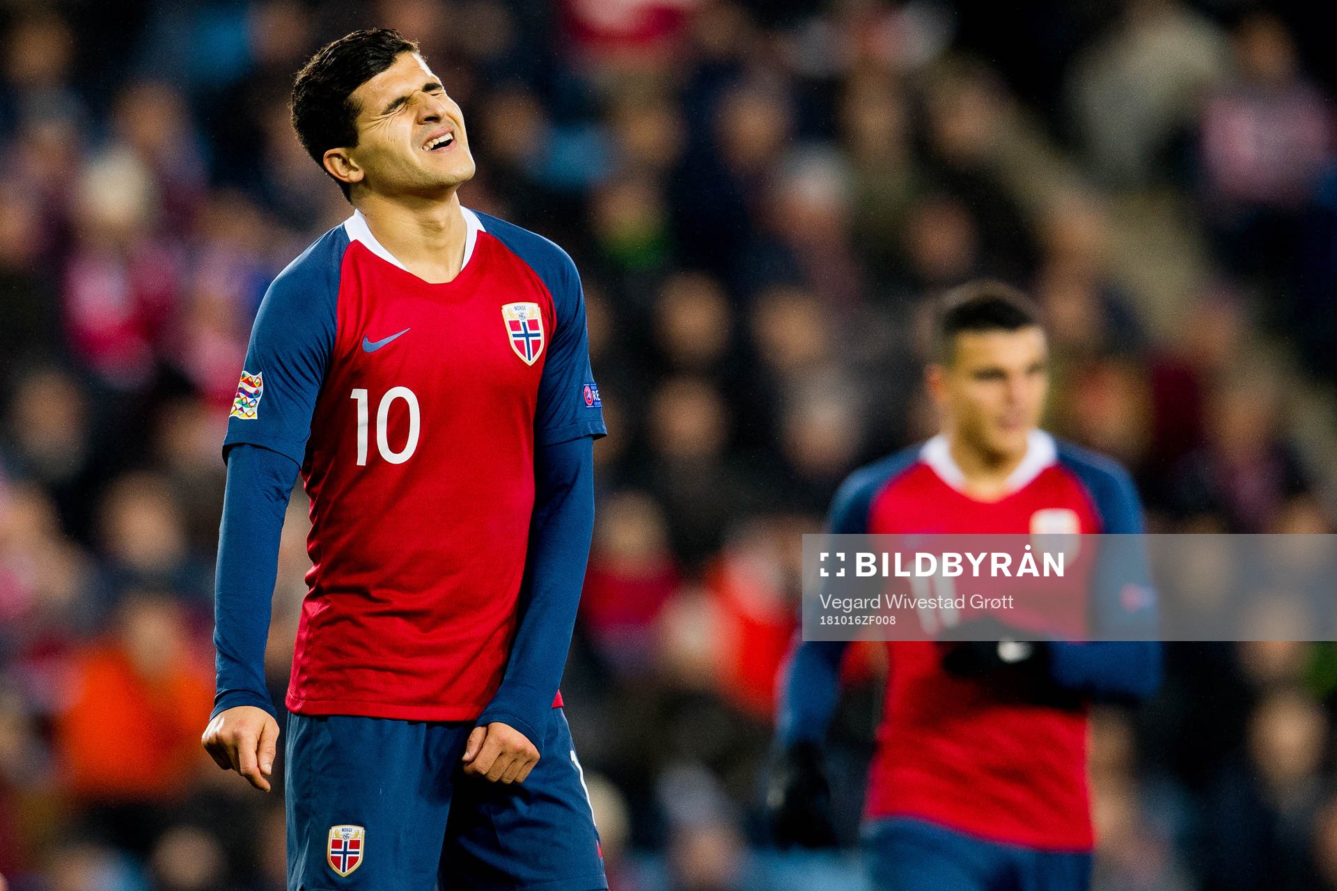 Tarik Elyounoussi of Norway looks dejected