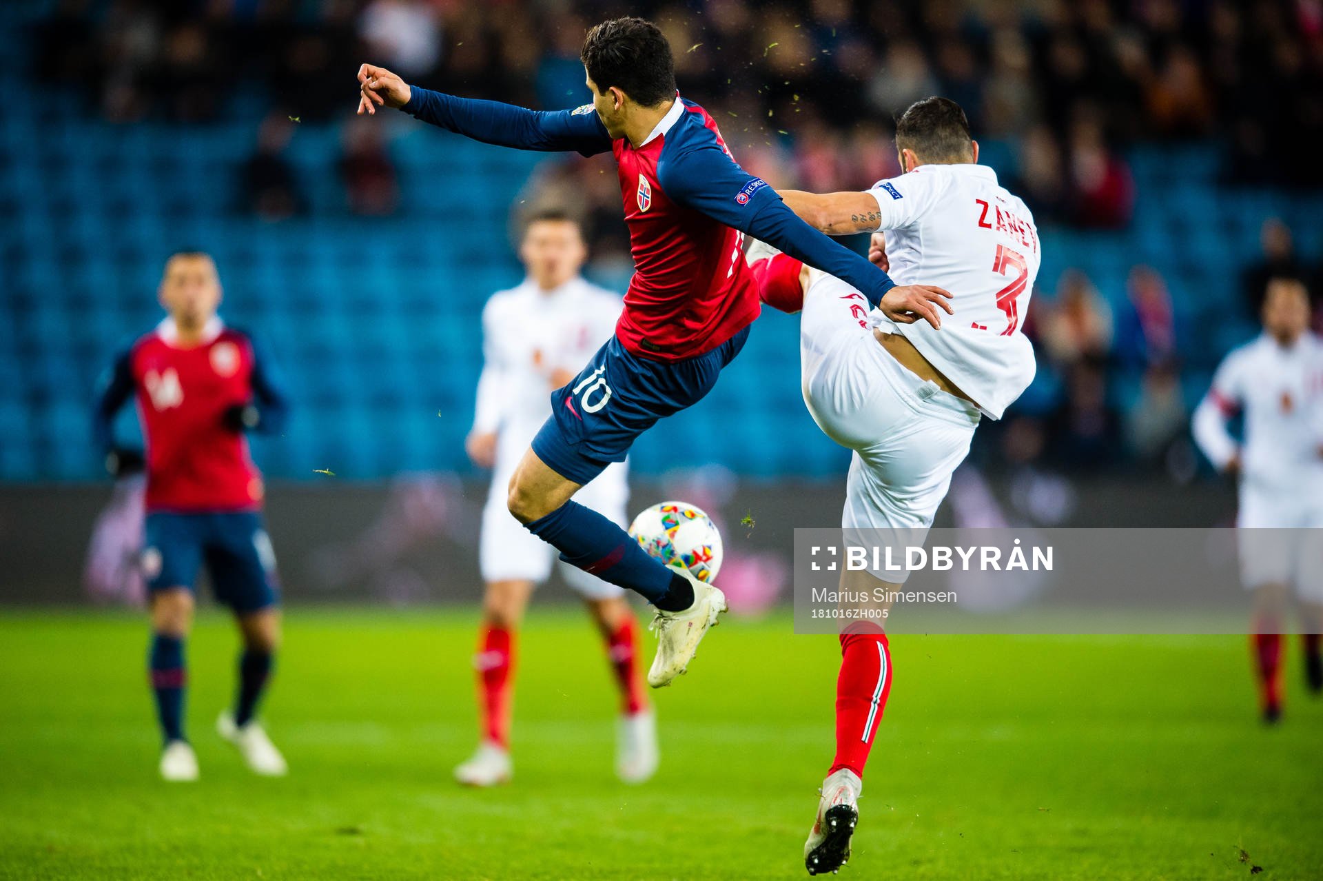 Tarik Elyounoussi of Norway and Petar Zanev of Bulgaria