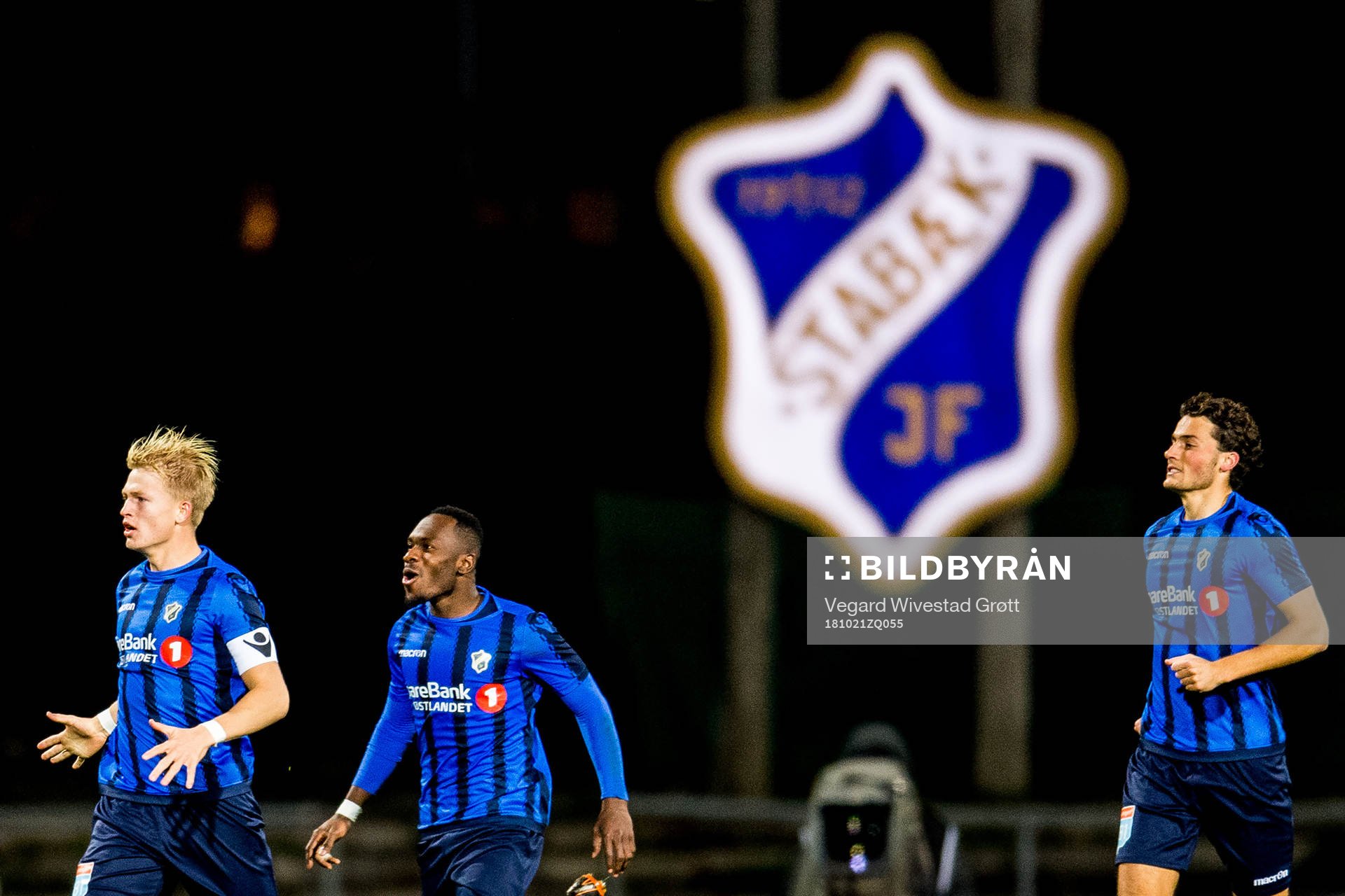 Franck Boli of Stabæk celebrates with teammates Andreas Hanche-Olsen and Daniel Granli after scoring 1-0 during the Eliteserien match between Stabæk and Brann on October 21, 2018 in Bekkestua.