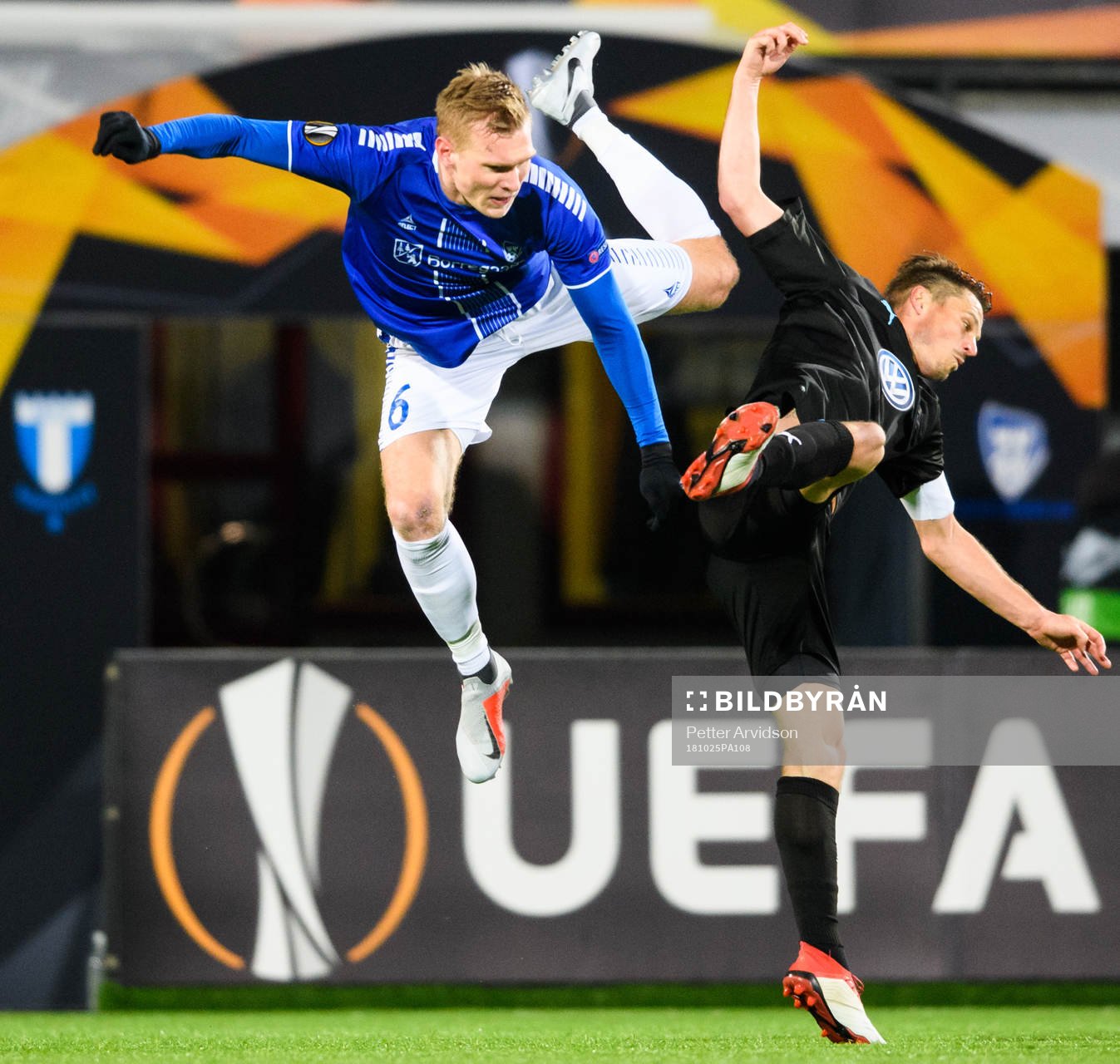 Joonas Tamm of Sarpsborg 08 in action with Markus Rosenberg