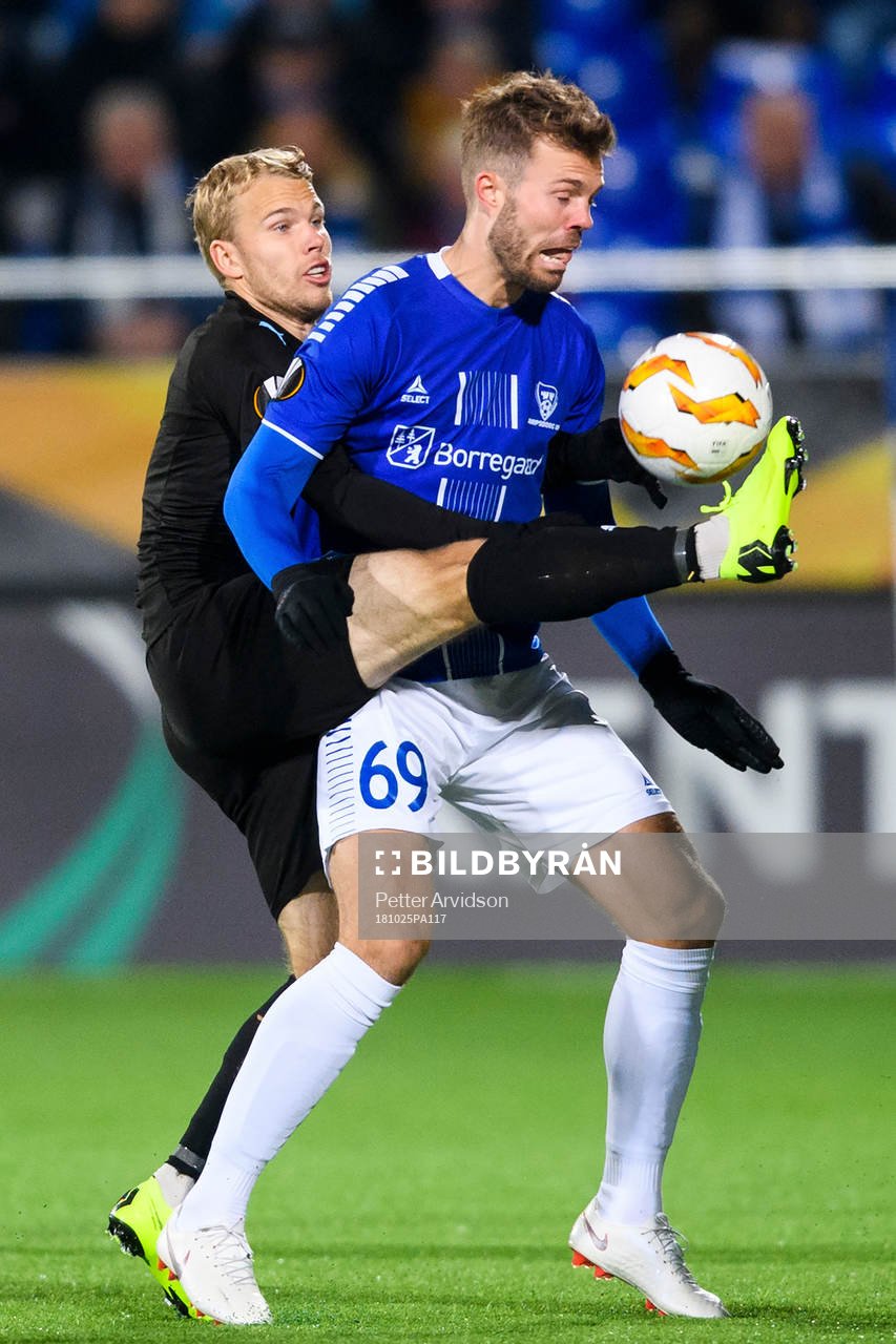 Oscar Lewicki of Malmö FF in action with Patrick Mortensen