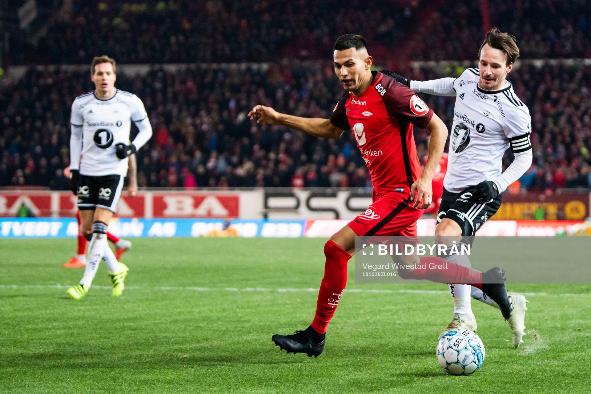 Deyver Vega of Brann and Mike Jensen of Rosenborg competes
