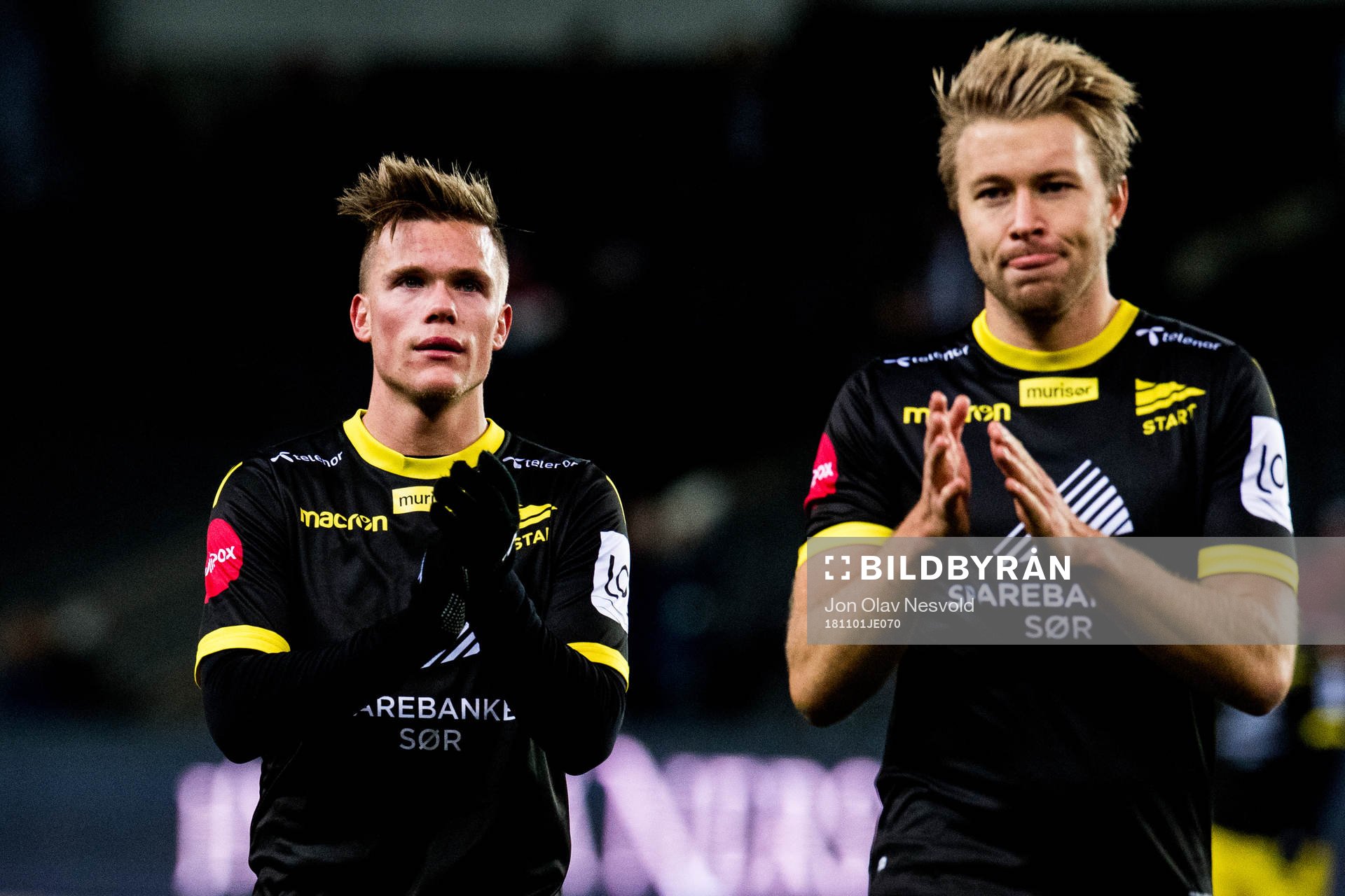 Eirik Wichne and Henrik Robstad of Start look dejected