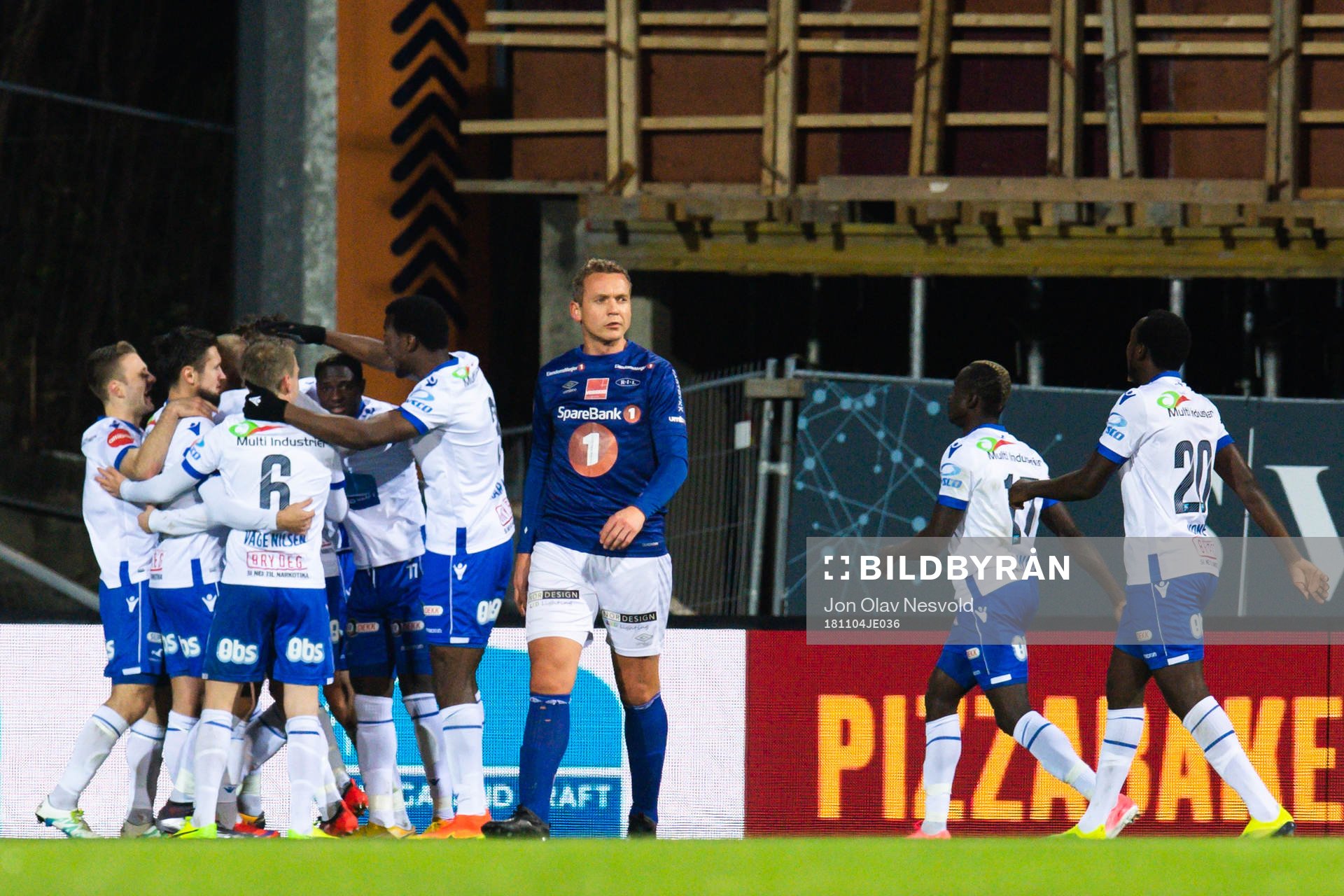 Øyvind Storflor of Ranheim looks dejected while players of