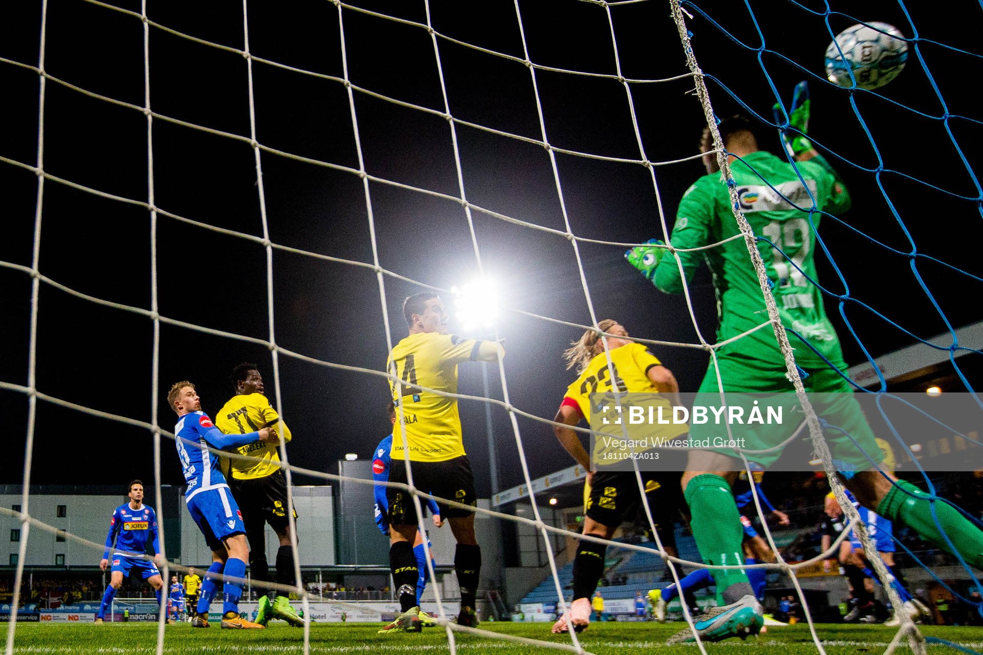 Damion Lowe of Start (hidden) scores 1-1 behind goalkeeper
