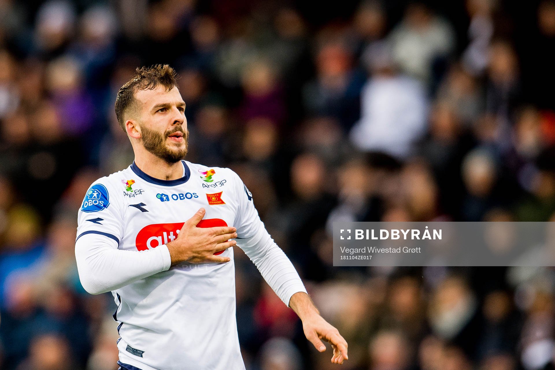 Zlatko Tripic of Viking gestures towards the away fans