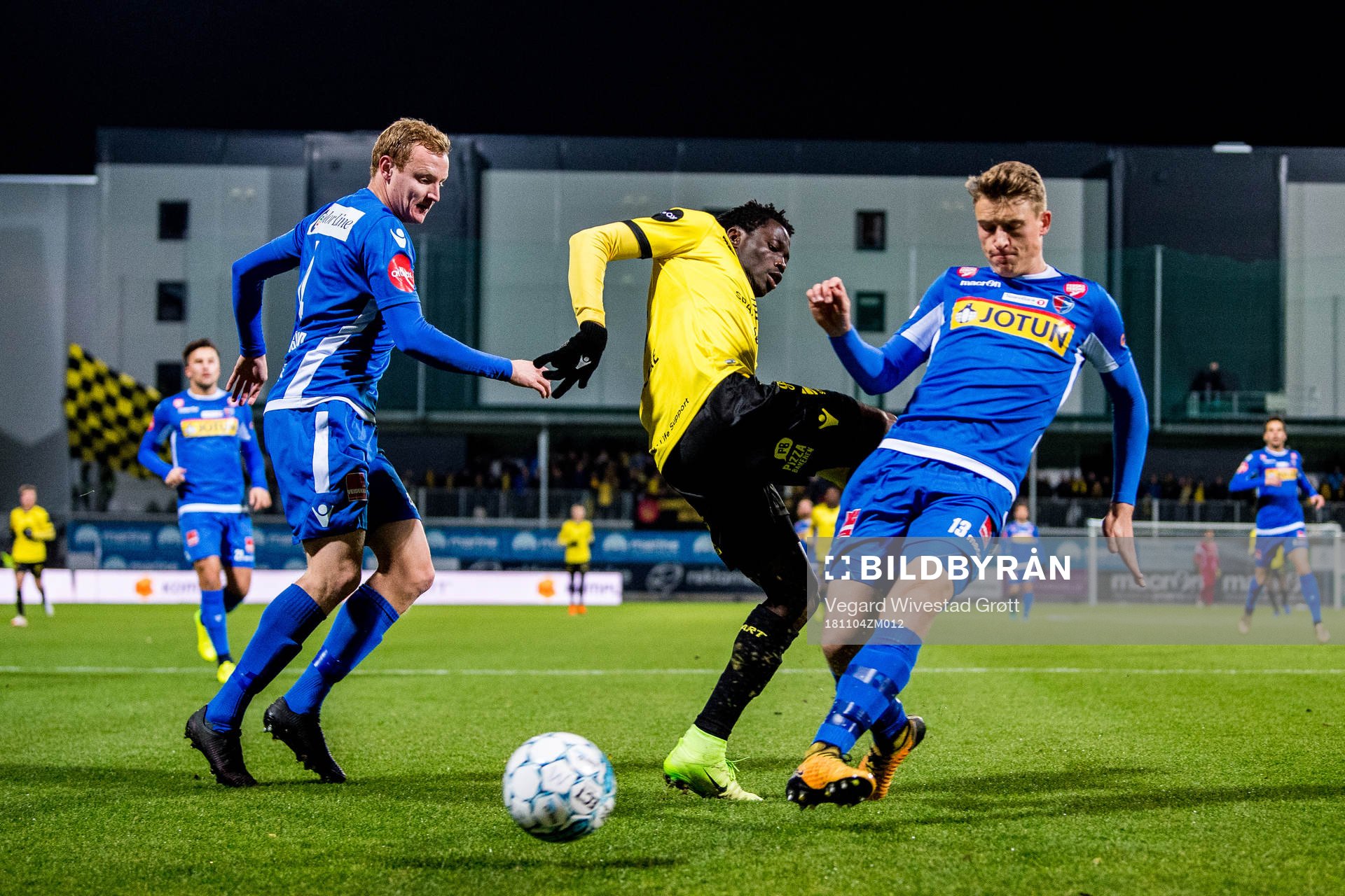 Christer Reppesgård Hansen of Sandefjord, Adeleke Akinyemi of Start and Marius Høibråten of Sandefjord during the Eliteserien match between Sandefjord and Start on November 4, 2018 in Sandefjord.