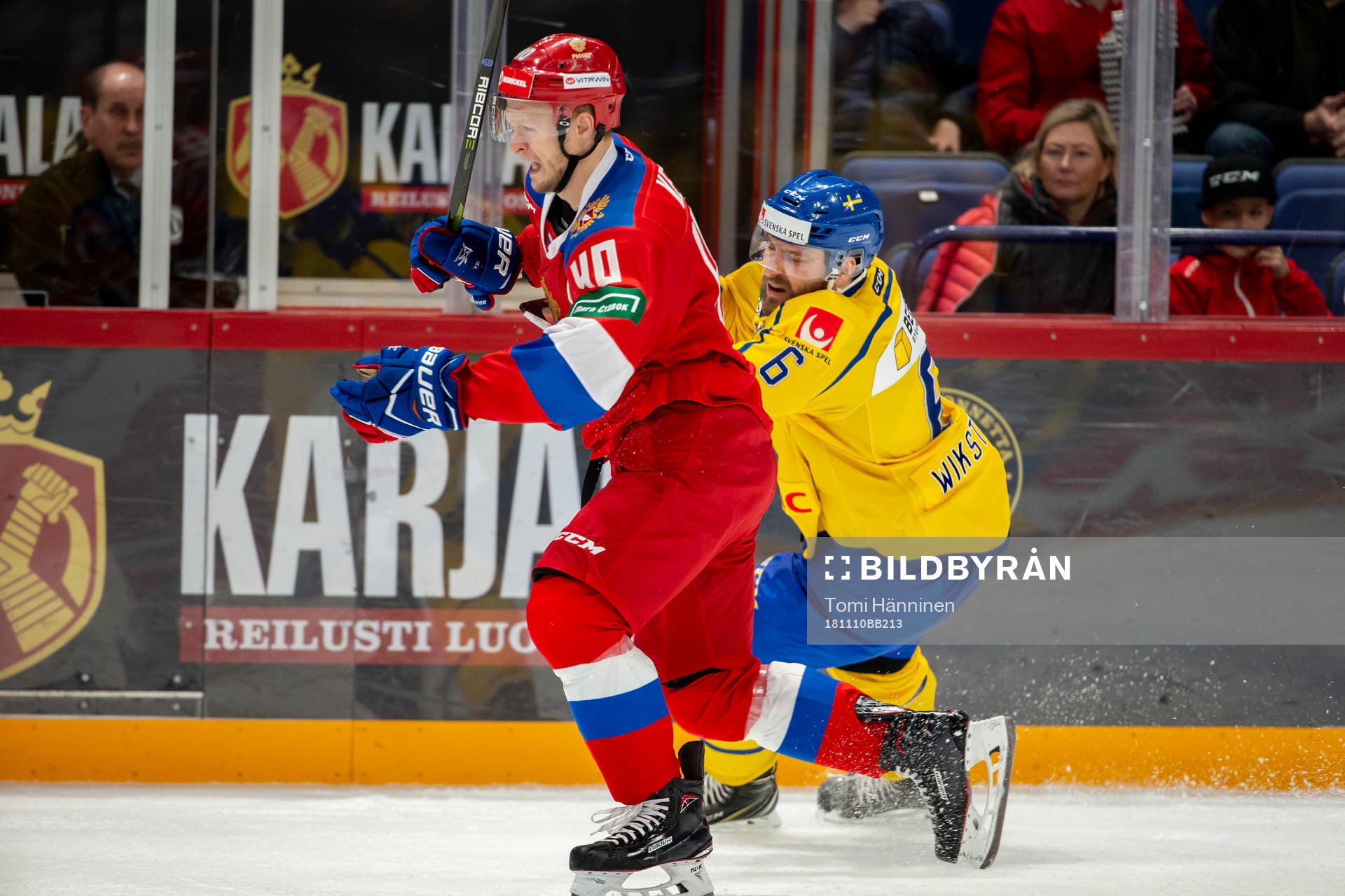Evgeni Ketov #40, RUS go around the Mikael Wikstrand #6,