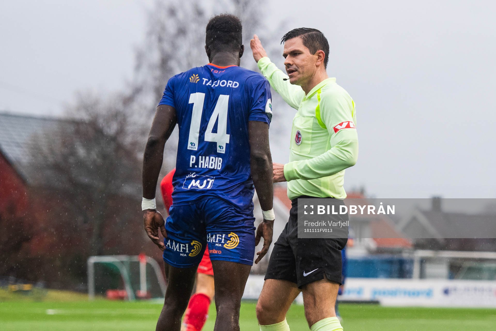 Pape Habib Gueye of Aalesund and Steinar Hauge, referee, in