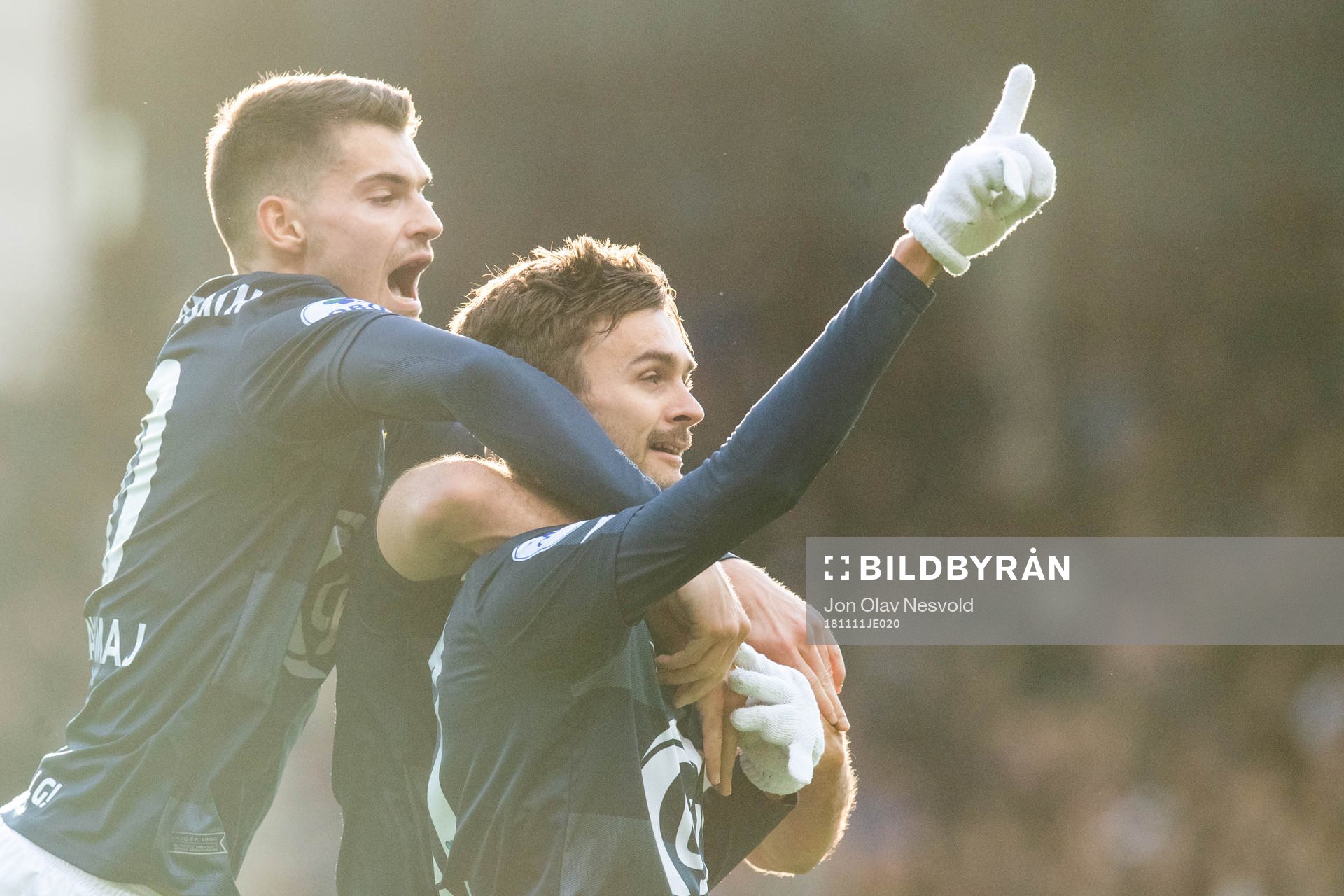 Ylldren Ibrahimaj and Johnny Furdal of Viking celebrate