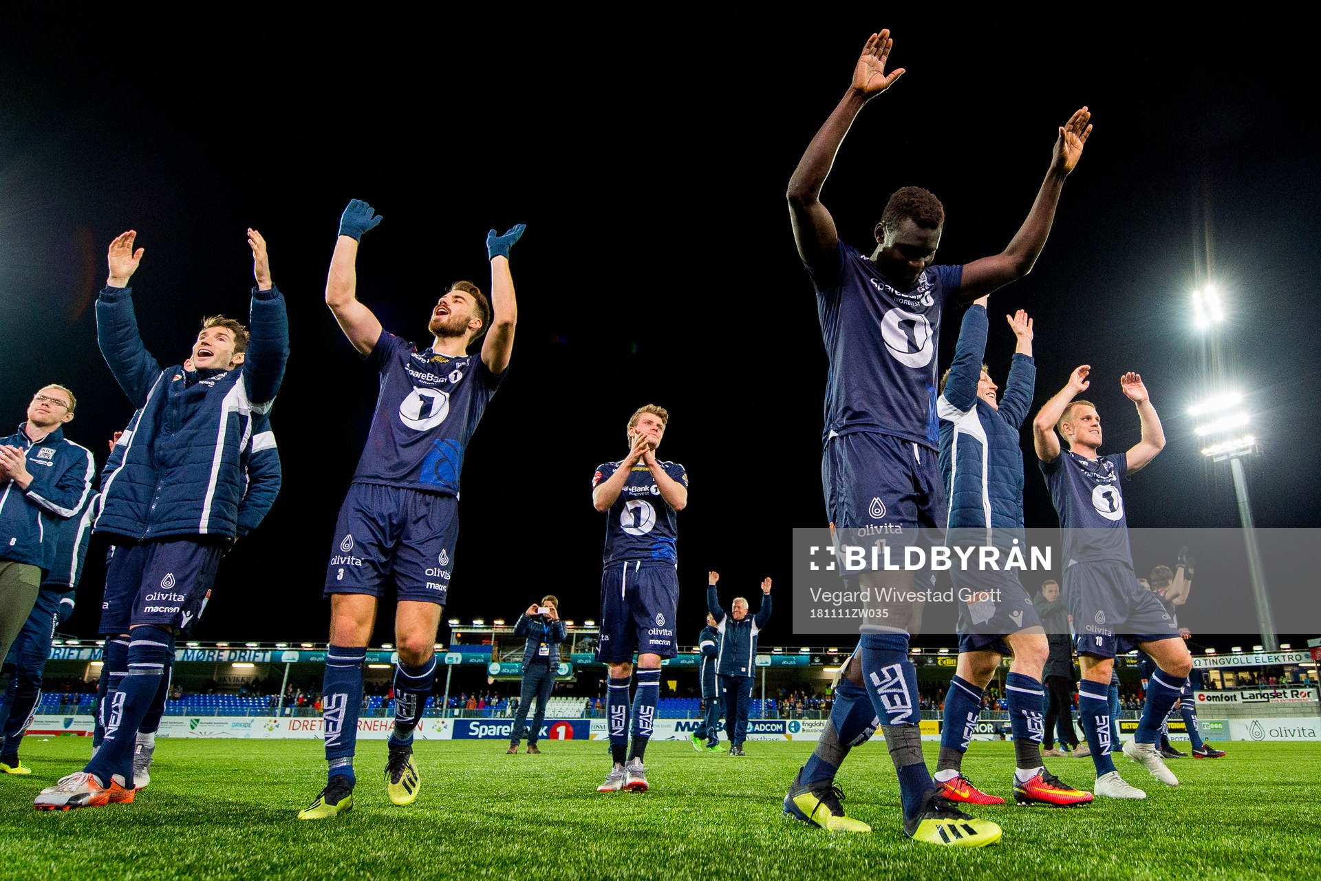Aliou Coly and the players of Kristiansund celebrate
