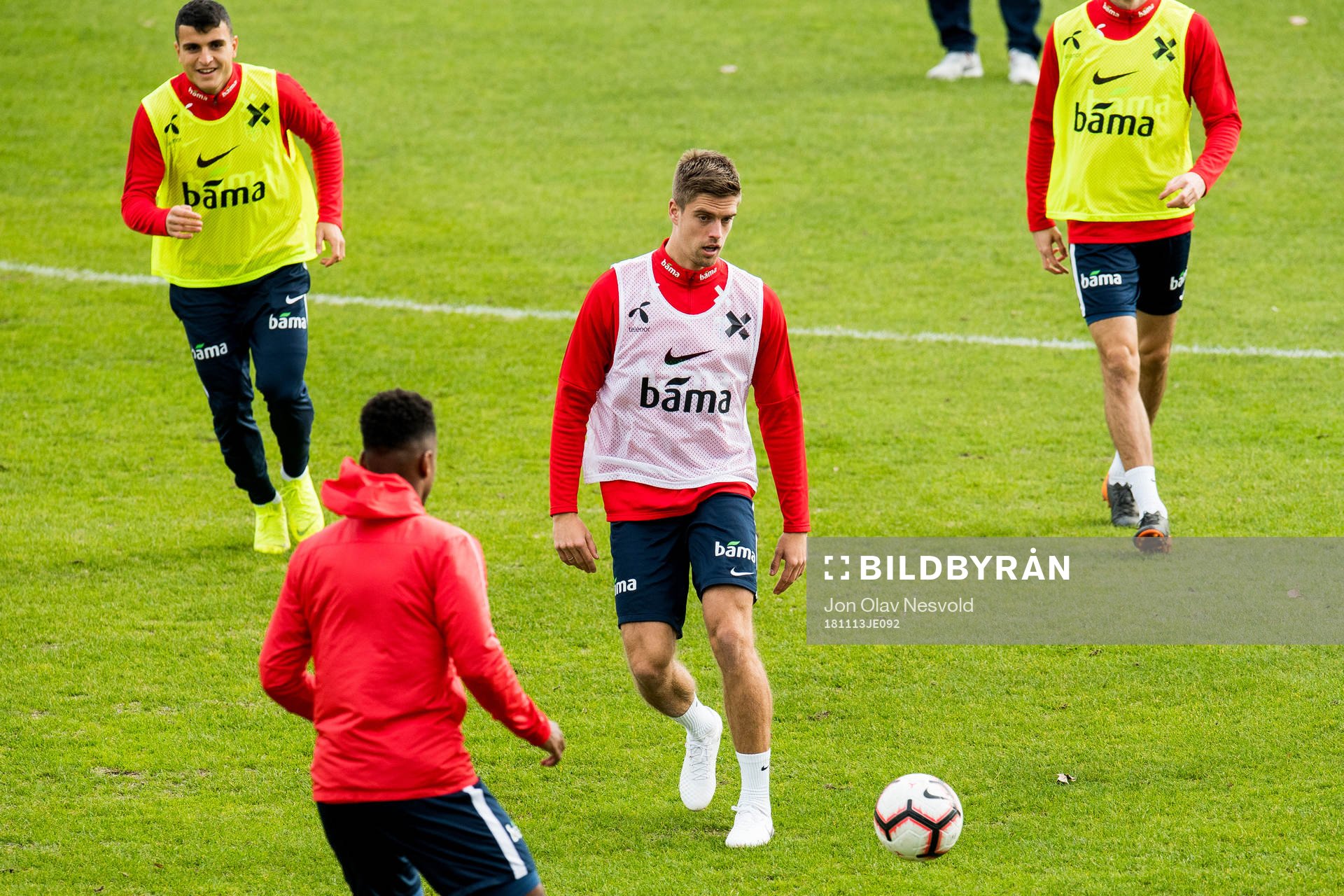 Mohamed Elyounoussi and Markus Henriksen of Norway