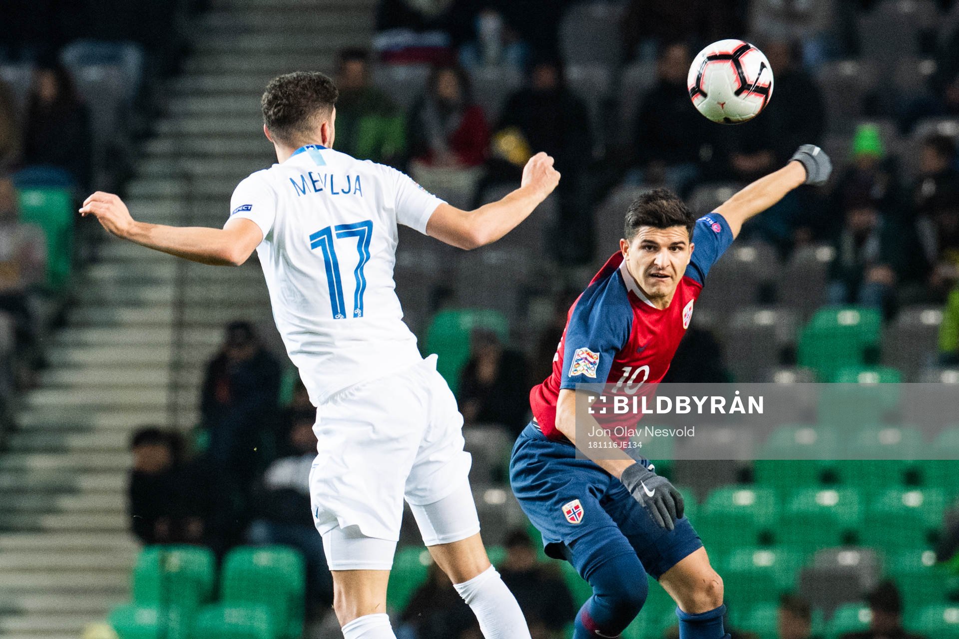 Miha Mevlja of Slovenia and Tarik Elyounoussi of Norway