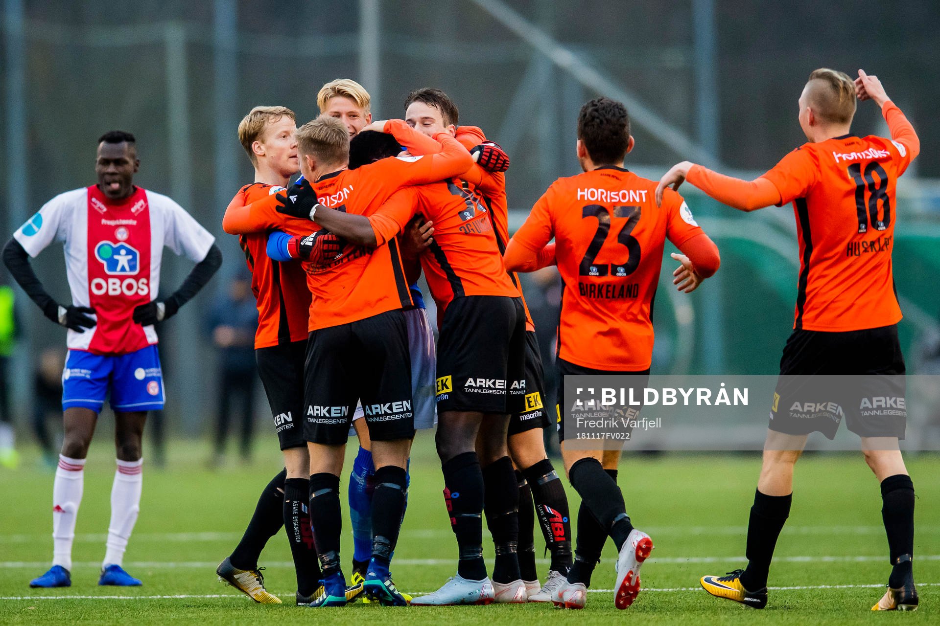 Michael Ogungbaro of Åsane celebrates with his teammates