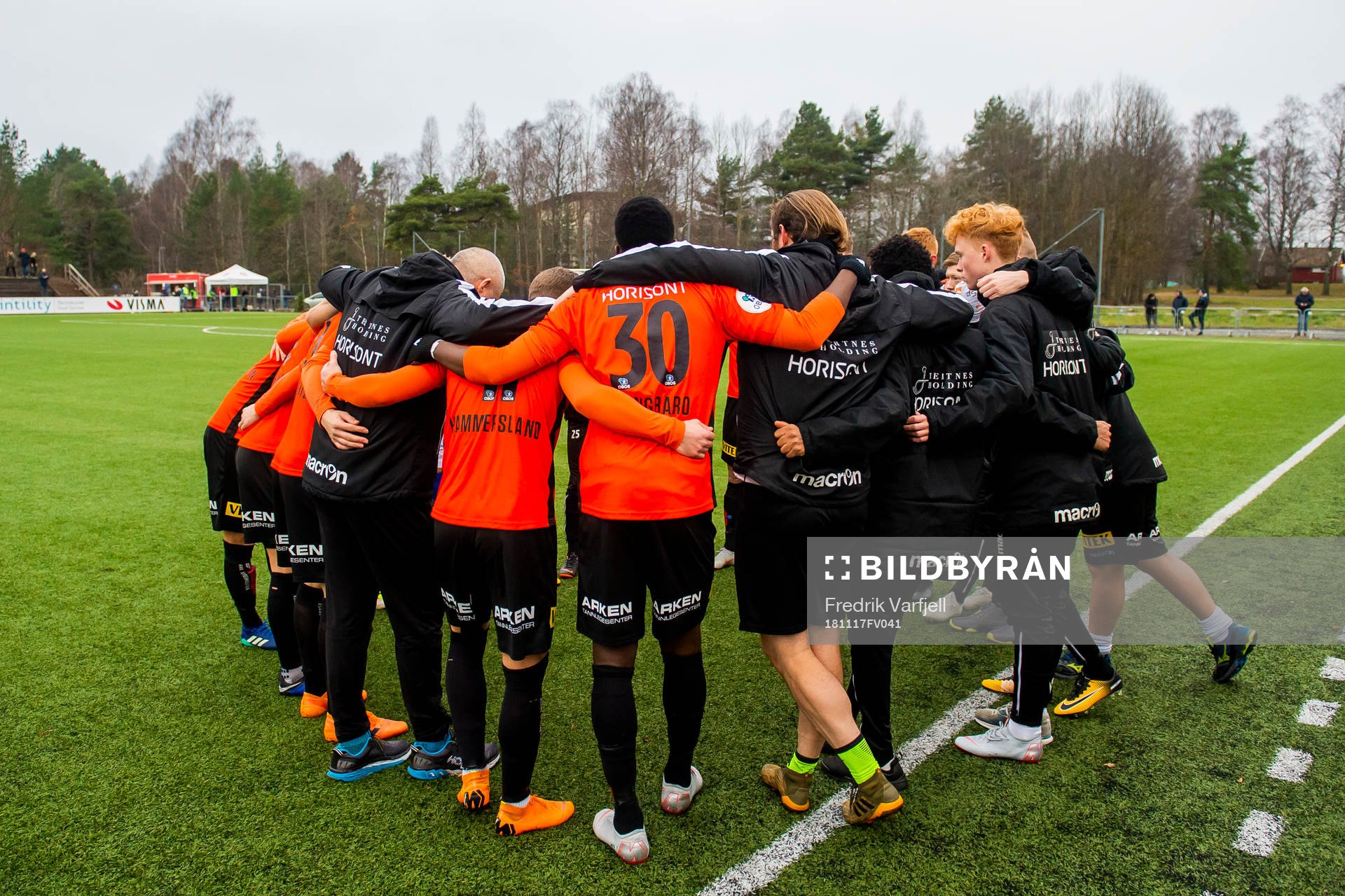 The players of Åsane ahed of the playoff match for