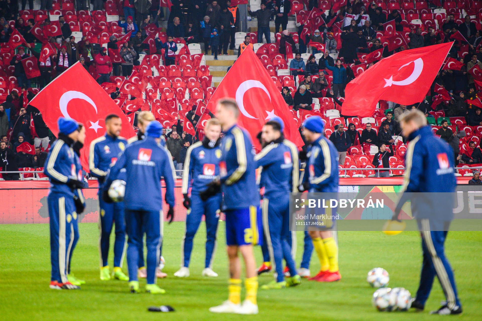 Turkish flags behind players of Sweden