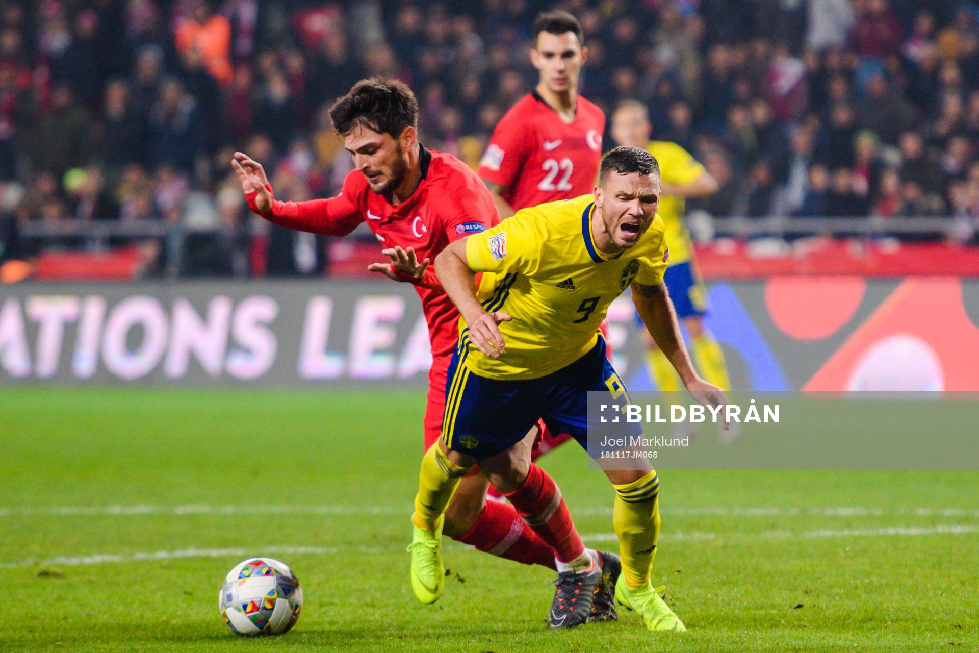 Okay Yokuslu of Turkey in duel with Marcus Berg of Sweden during the Nations League football match between Turkey and Sweden on November 17, 2018 in Konya.
