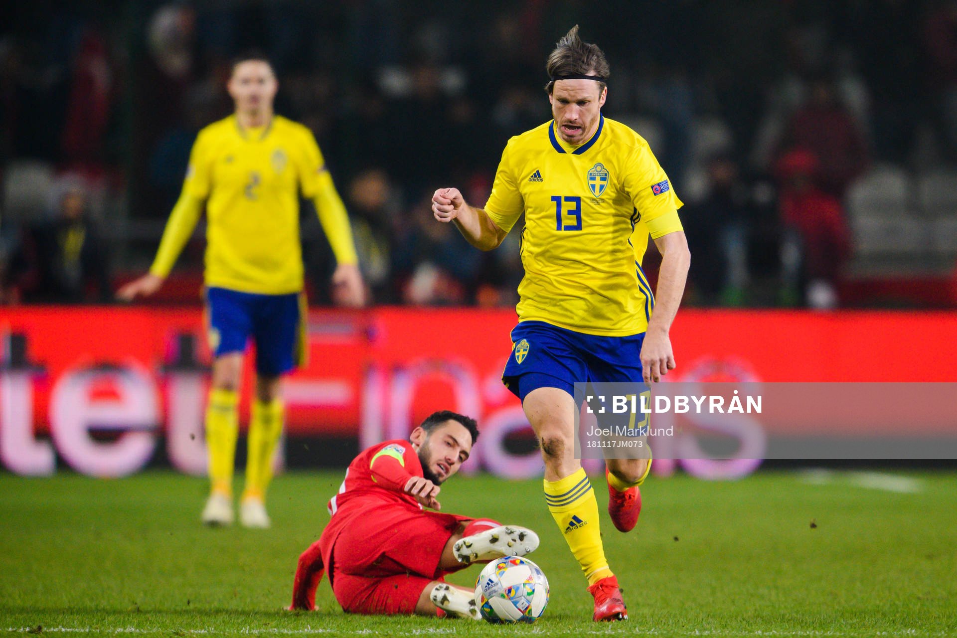 Hakan Calhanoglu of Turkey and Gustav Svensson of Sweden