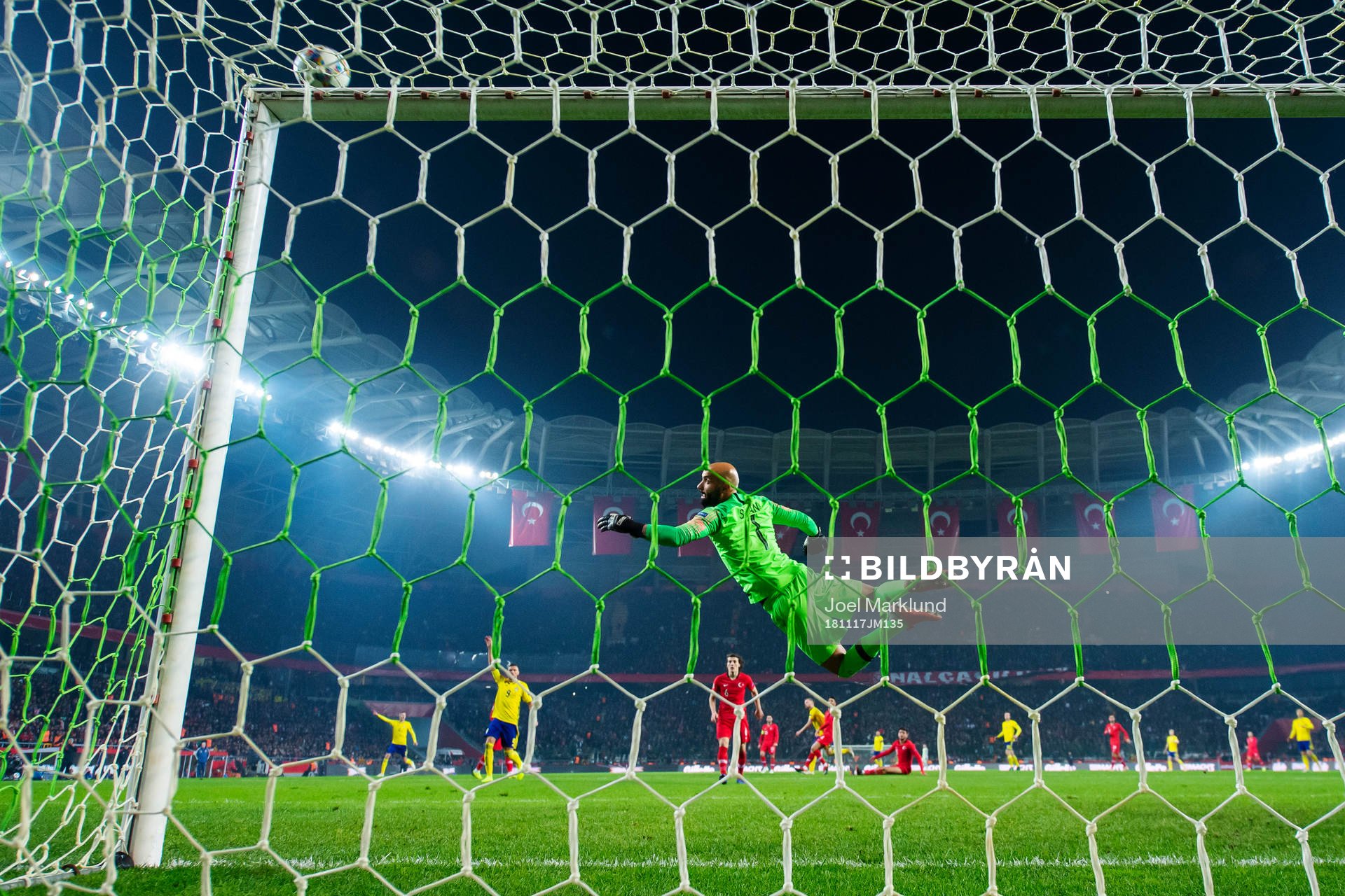 Goalkeeper Sinan Bolat of Turkey makes a save