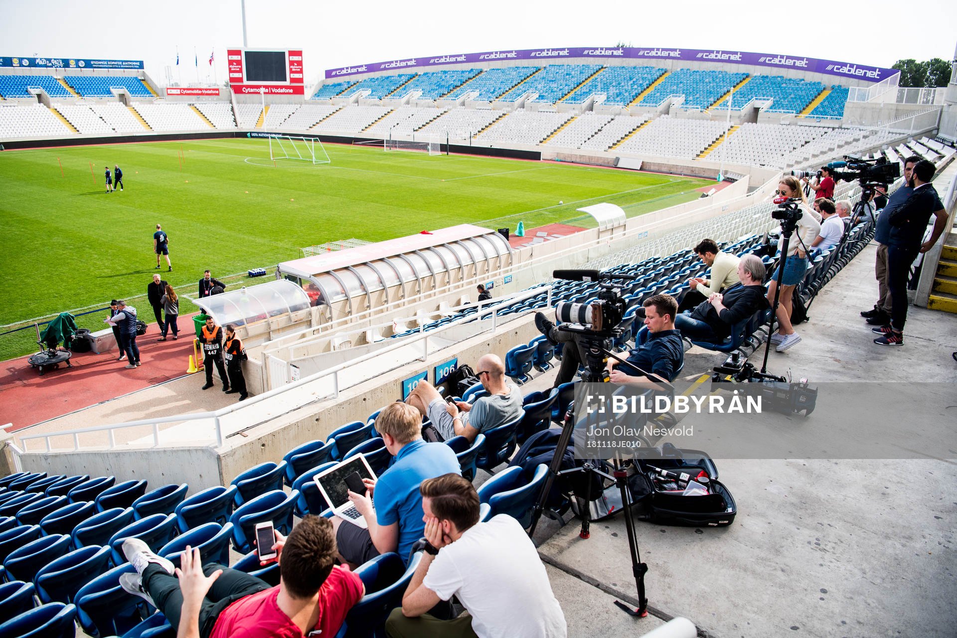 Journalists watch a training session