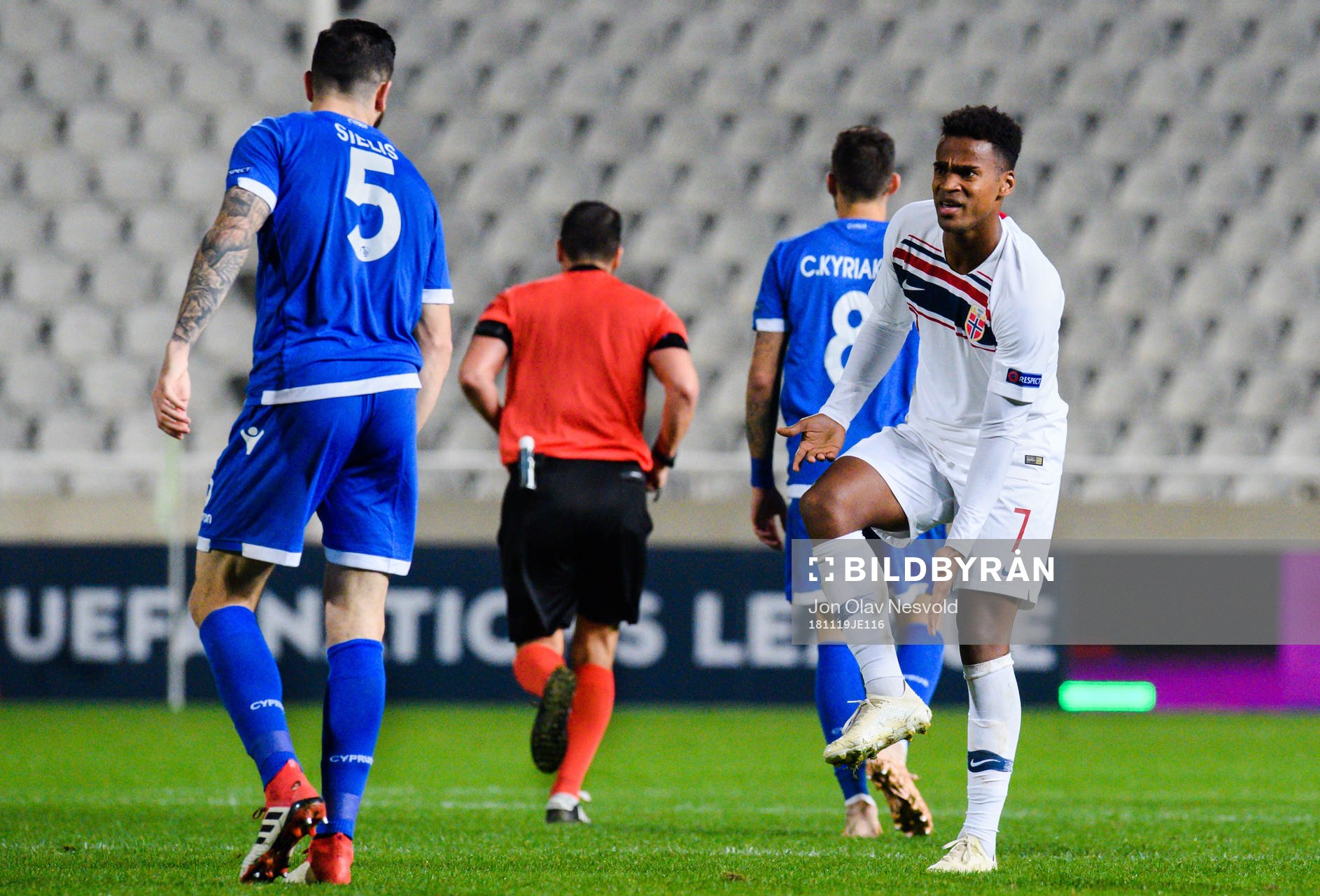 Ola Kamara of Norway reacts against Valentinos Sielis of