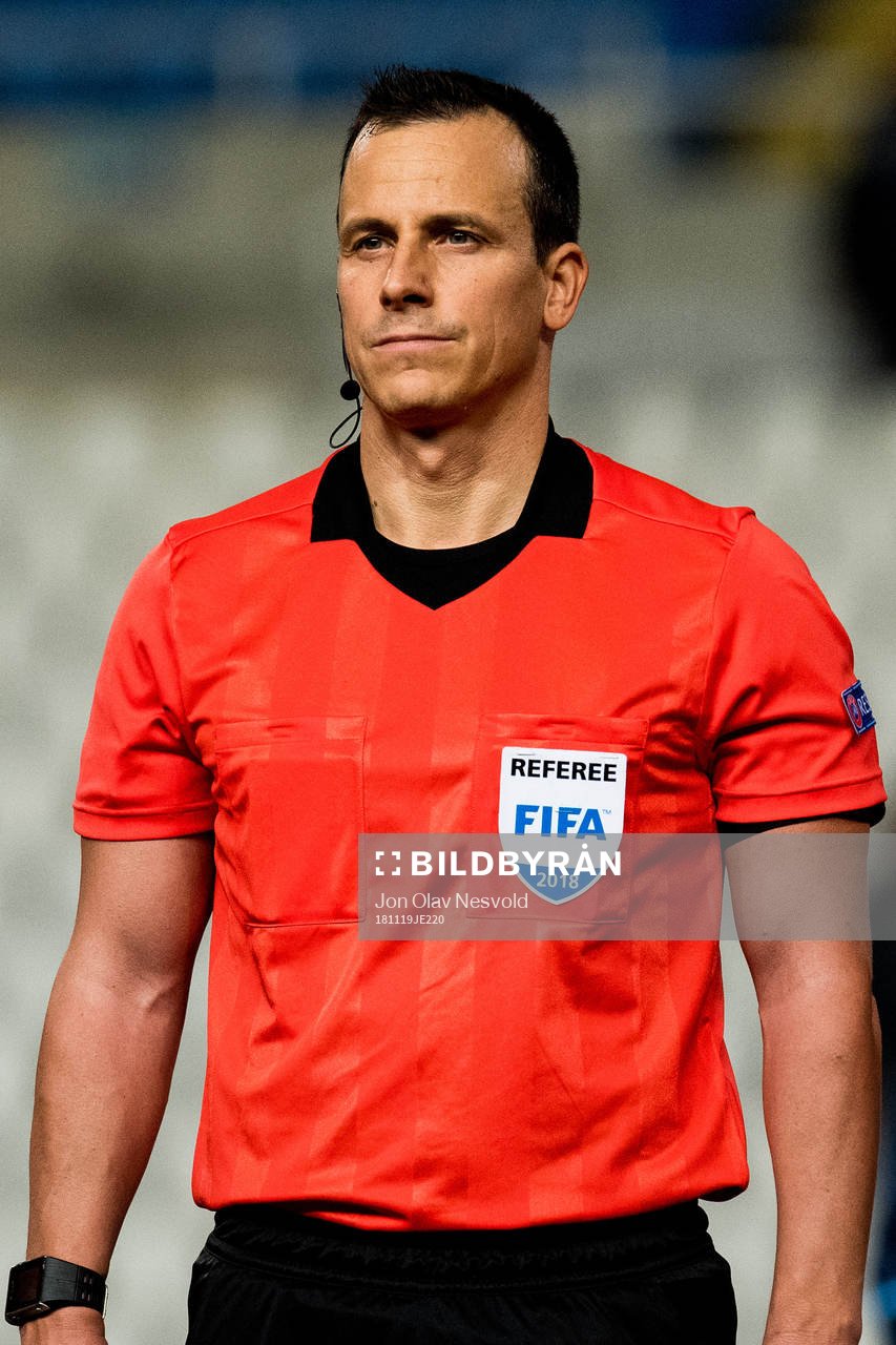 Referee István Vad of Hungary