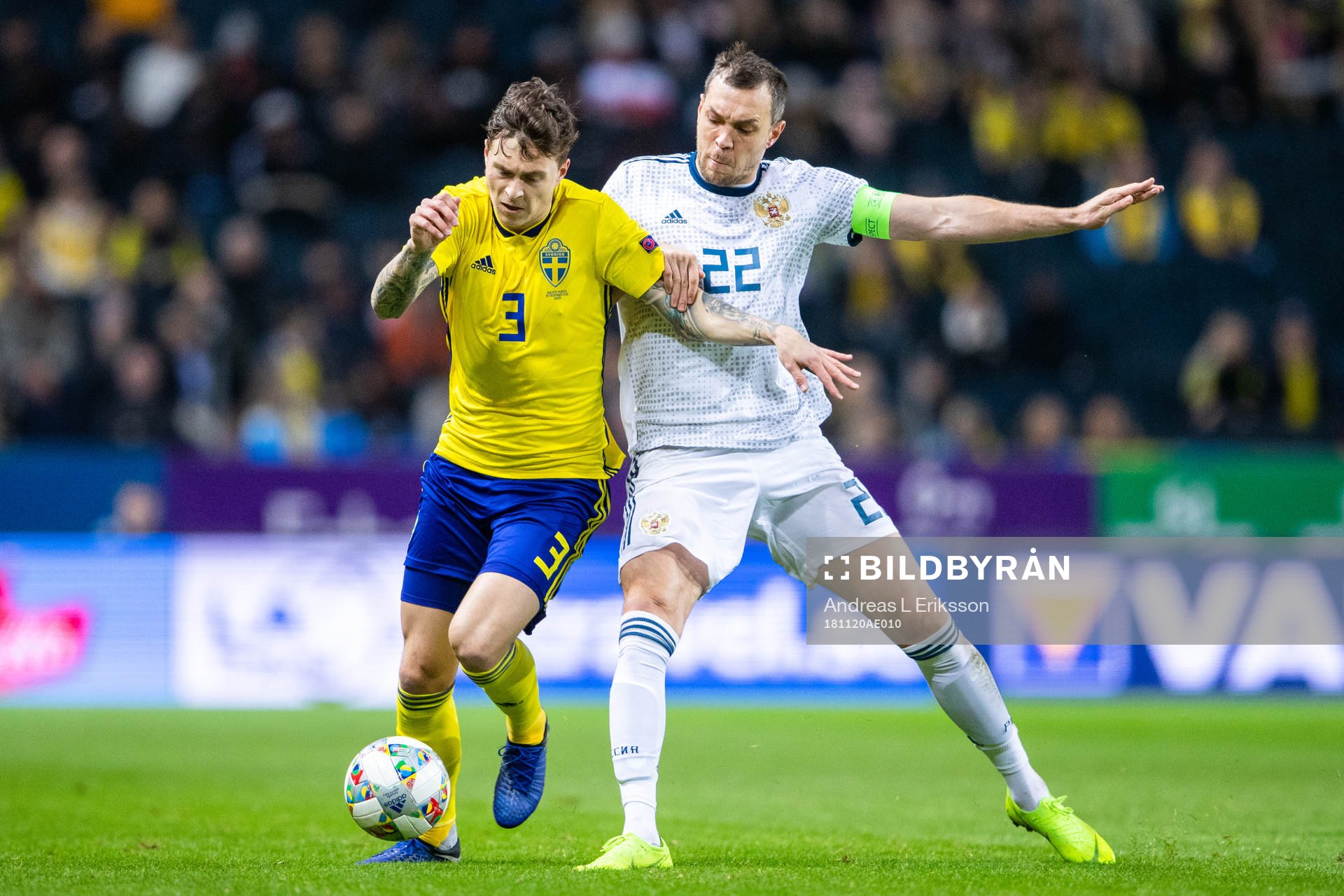 Victor Nilsson Lindelöf of Sweden and Artem Dzyuba of