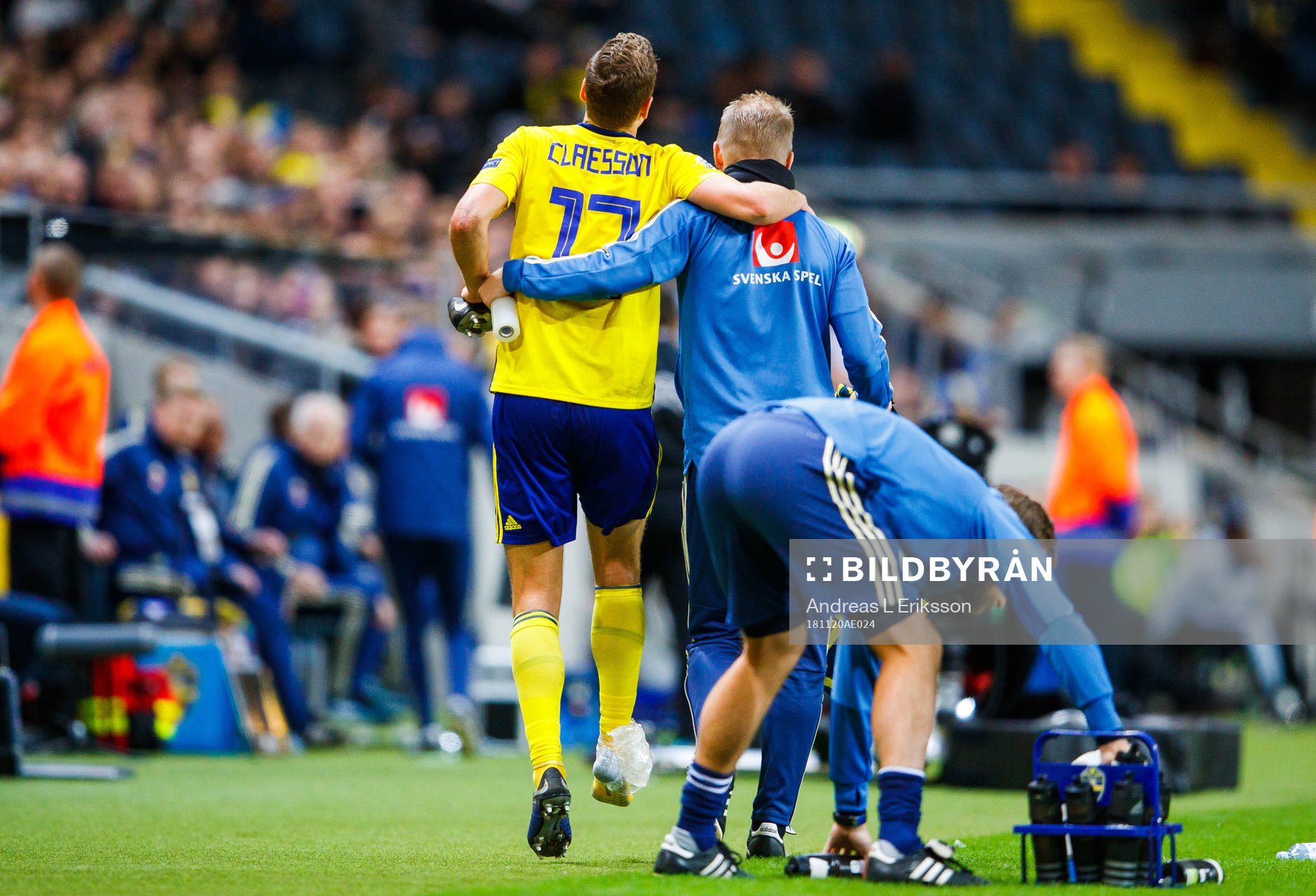 Viktor Claesson of Sweden receives help