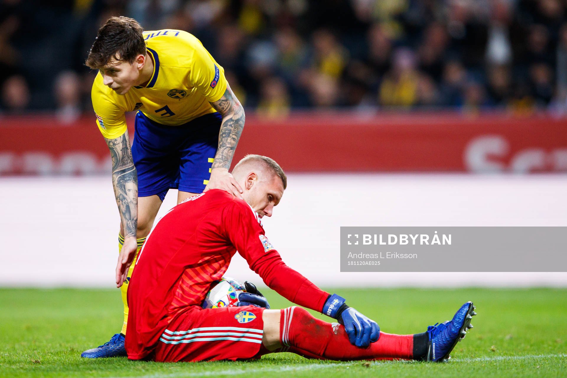 Victor Nilsson Lindelöf and goalkeeper Robin Olsen of