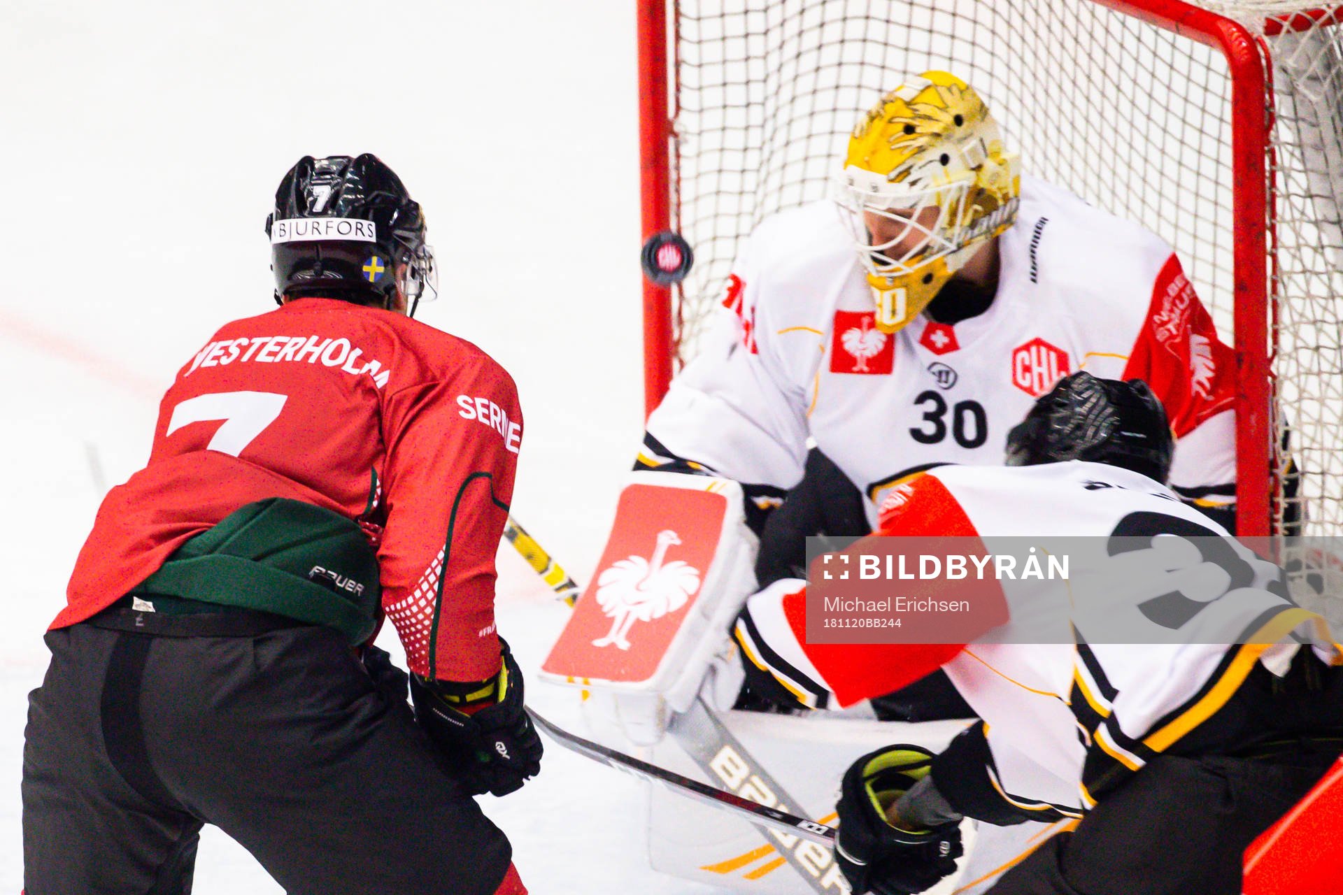 Pathrik Westerholm of Frölunda and goalkeeper Elvis