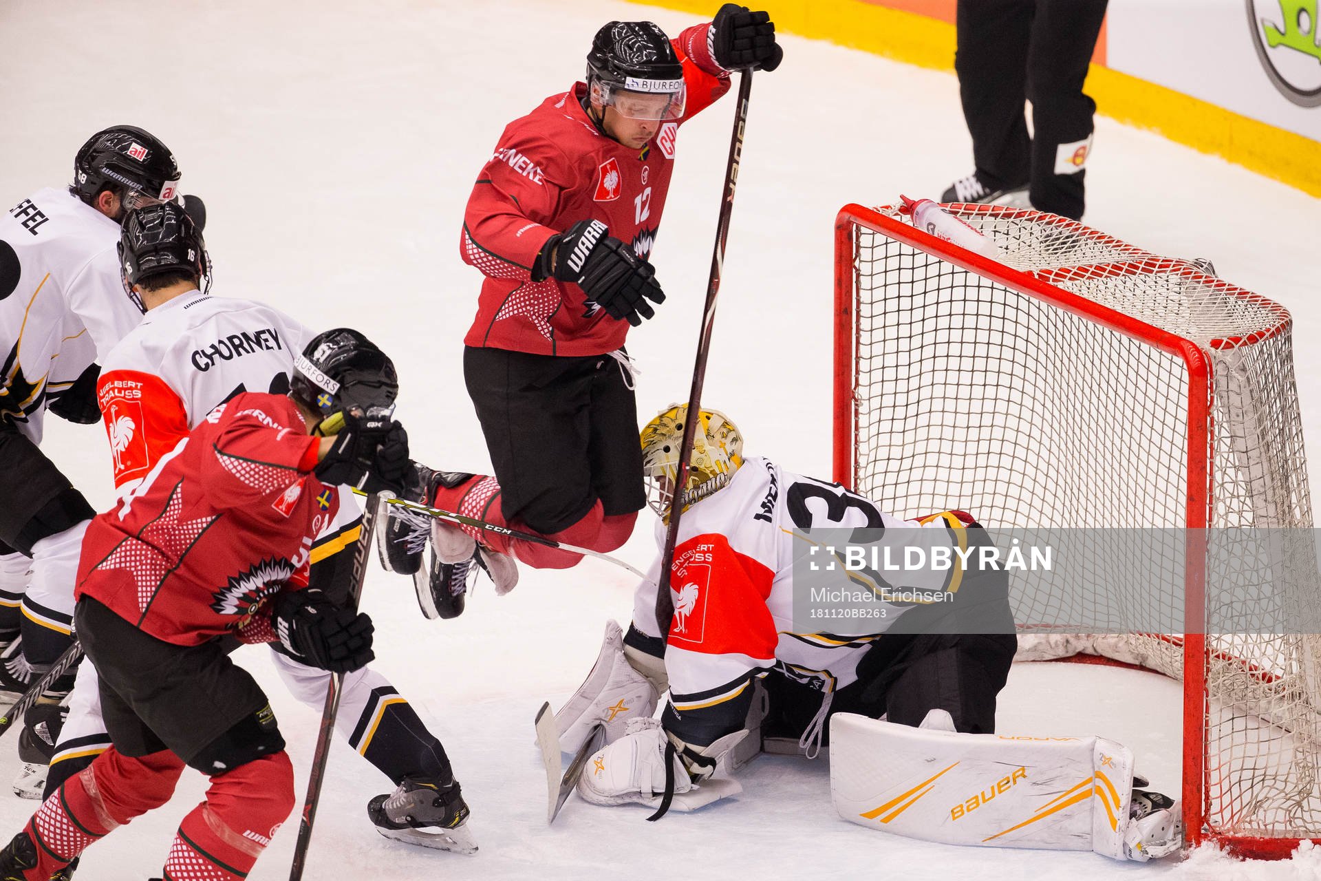 Max Friberg of Frölunda and goalkeeper Elvis Merzlikins of