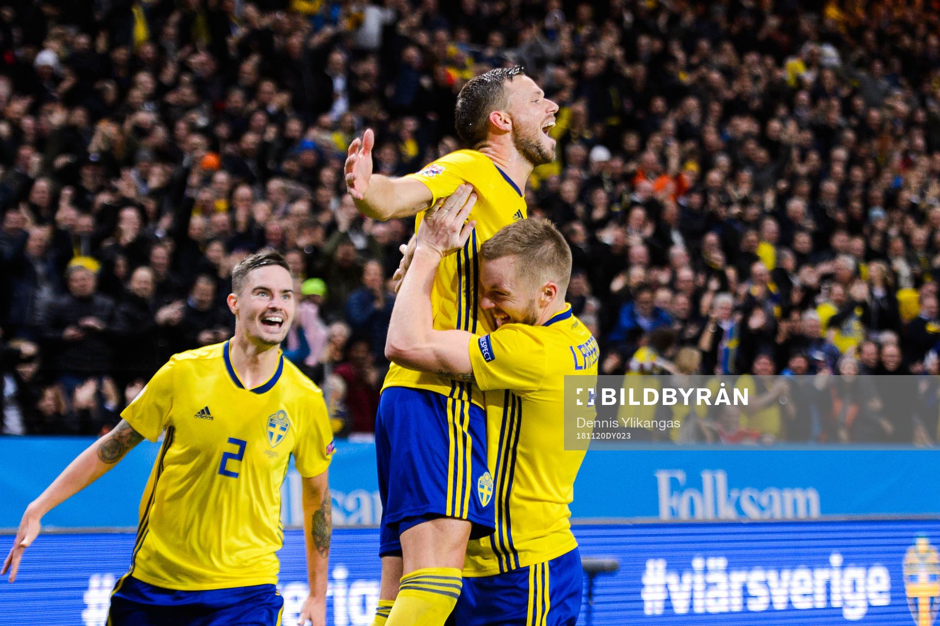 Mikael Lustig, Sebastian Larsson, and Marcus Berg of Sweden