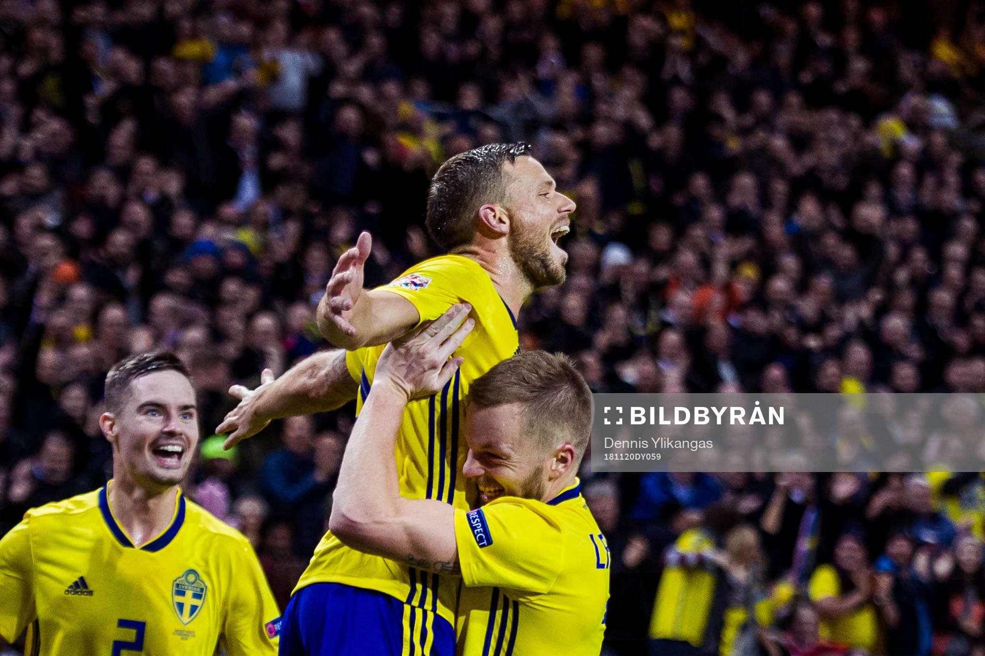 Marcus Berg of Sweden celebrates with his teammate