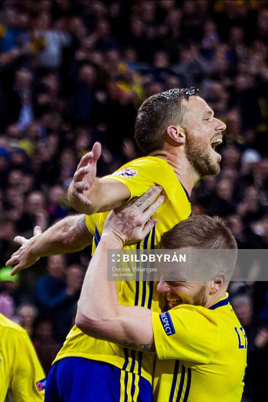 Marcus Berg of Sweden celebrates with his teammate