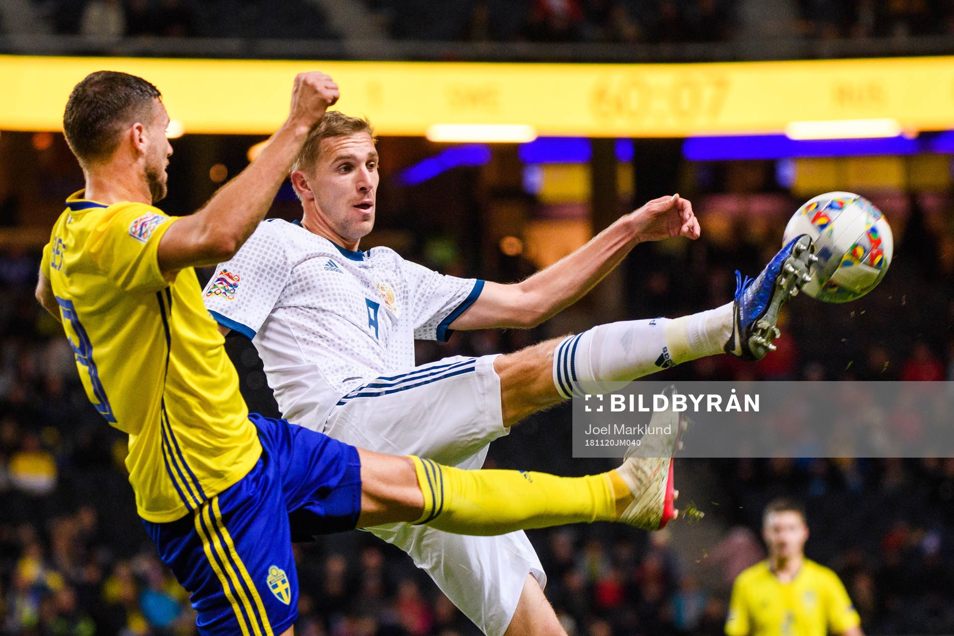 Anton Zabolotny of Russia and Marcus Berg of Sweden