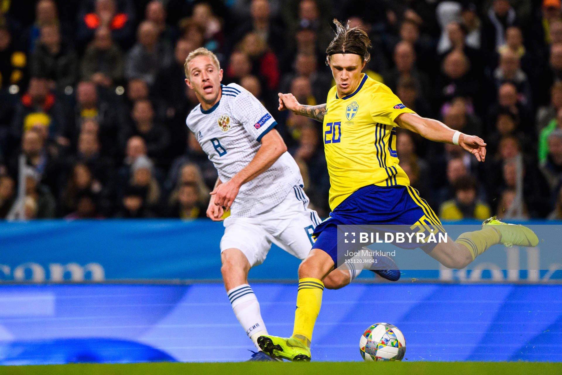 Iury Gazinsky of Russia and Kristoffer Olsson of Sweden during the Nations League football match between Sweden and Russia on November 20, 2018 in Stockholm.
