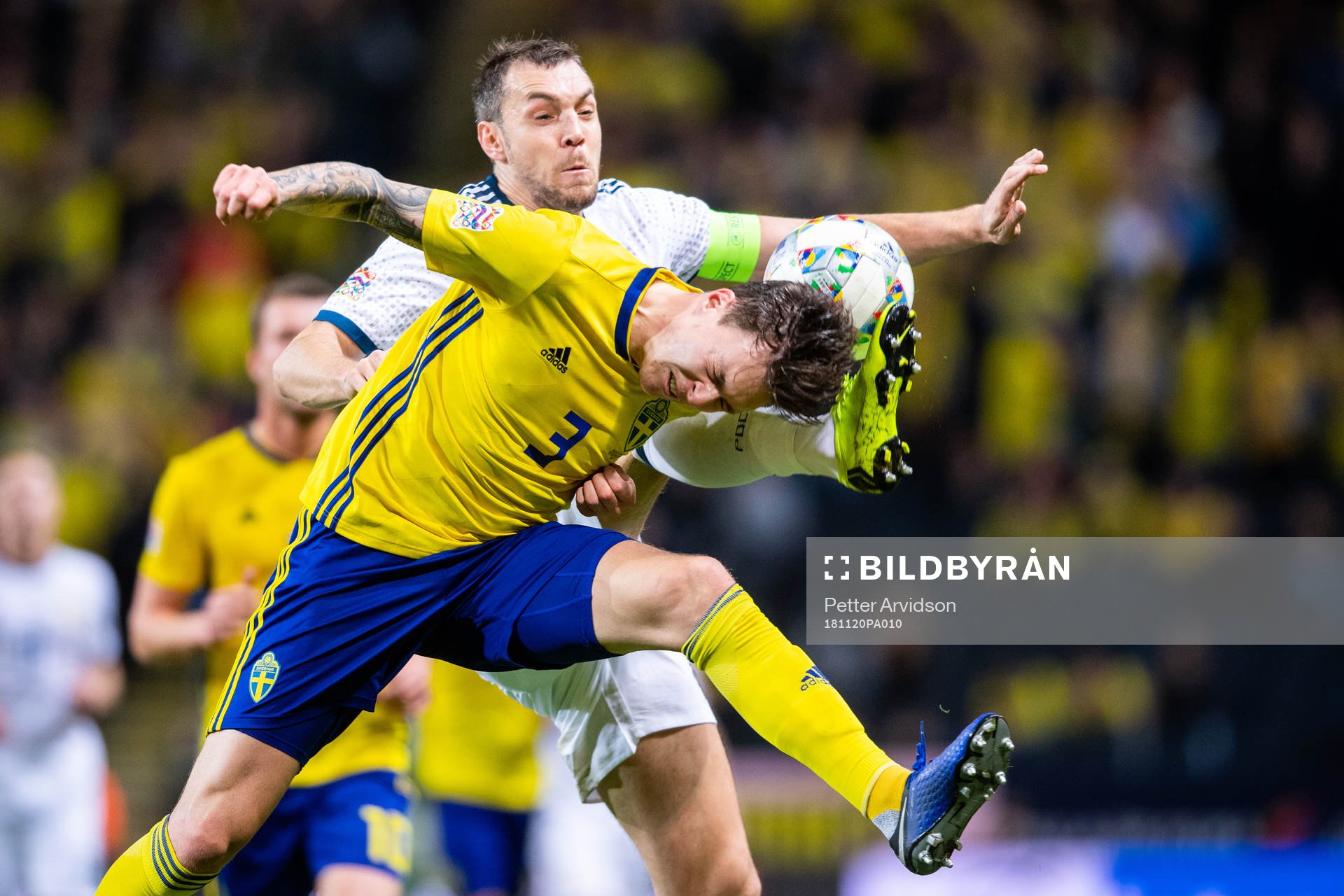 Victor Nilsson Lindelöf of Sweden and Artem Dzyuba of