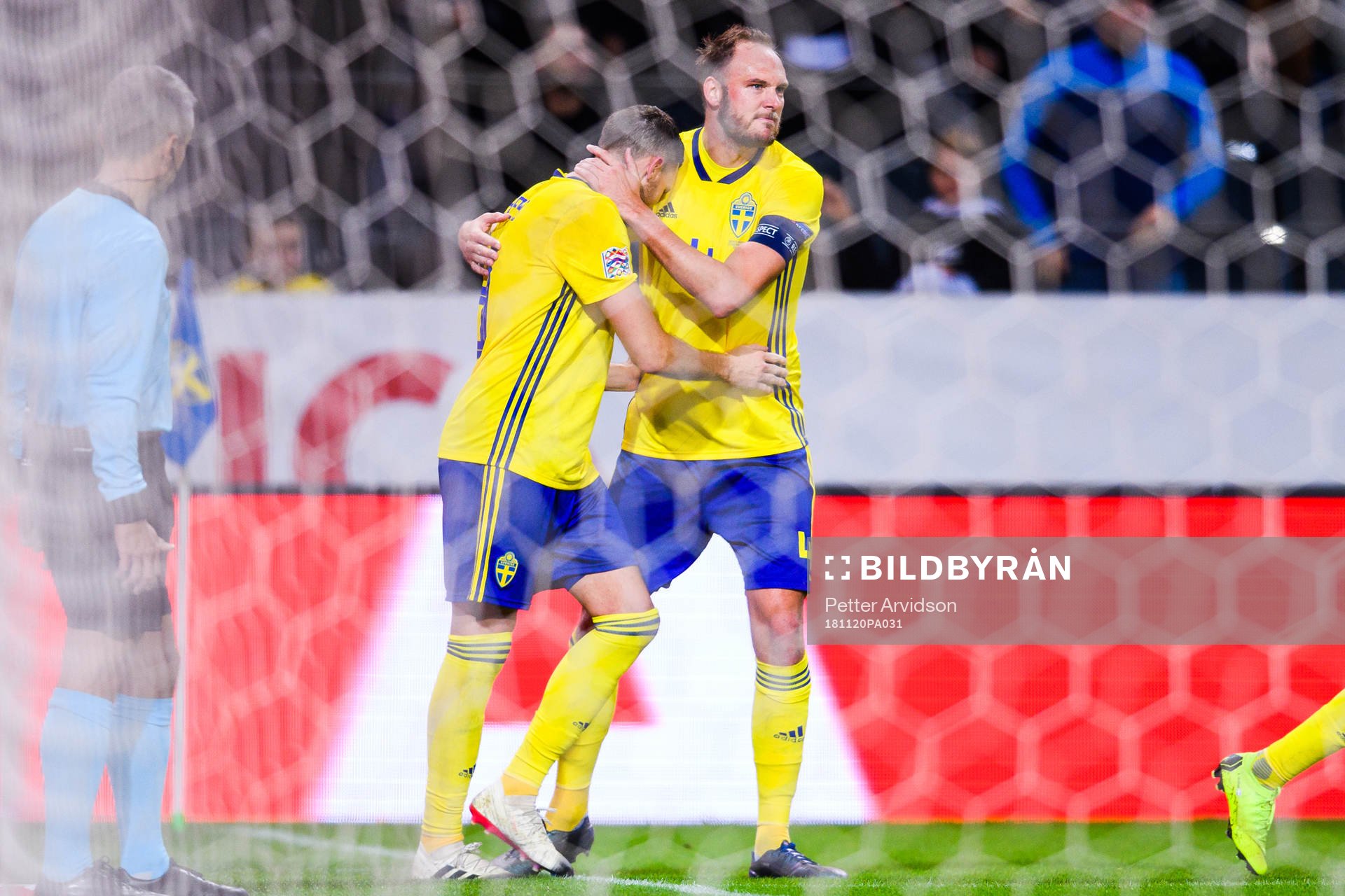 Andreas Granqvist and Marcus Berg of Sweden celebrates