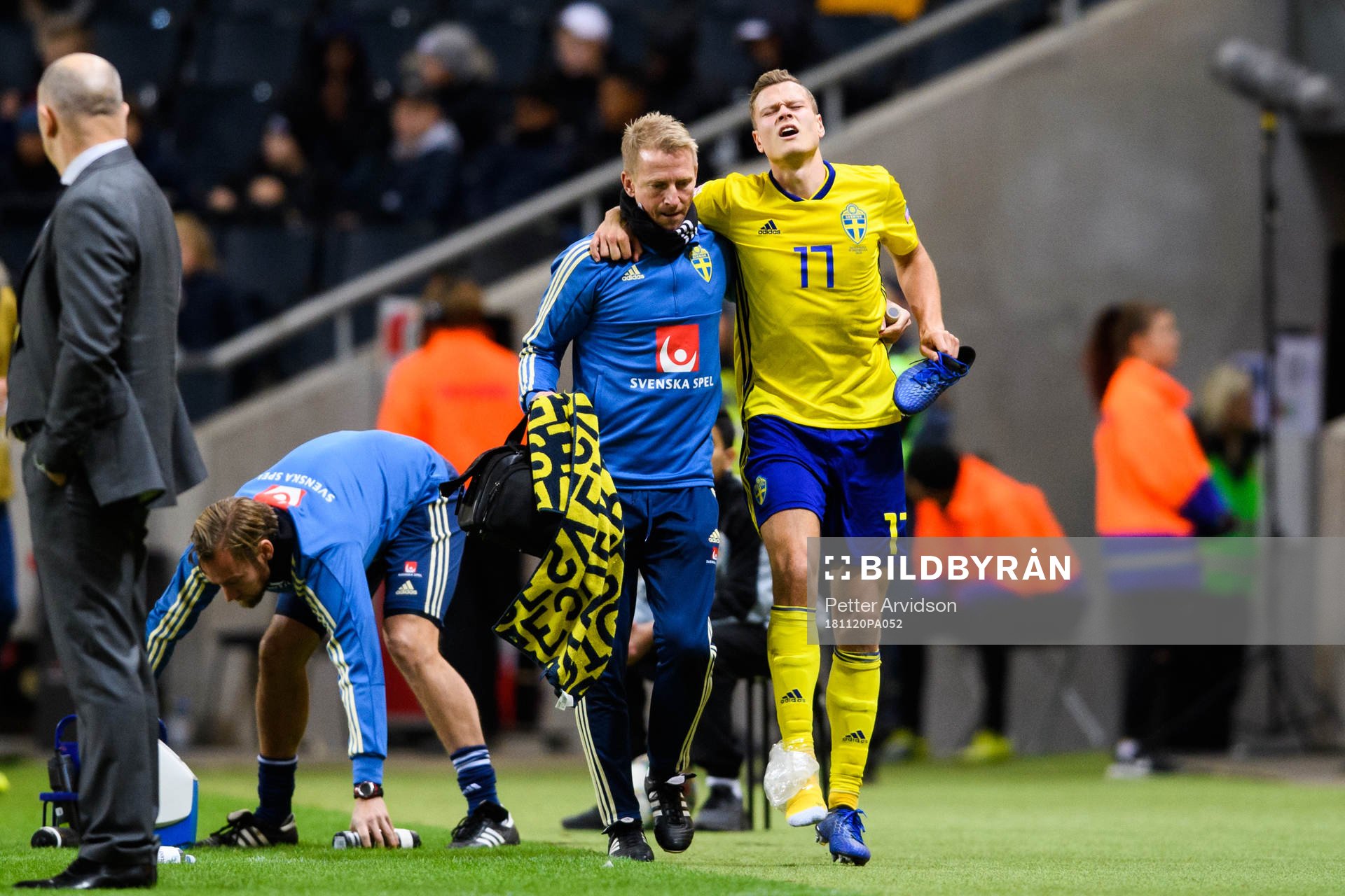 Viktor Claesson of Sweden leaves the pitch with a injury