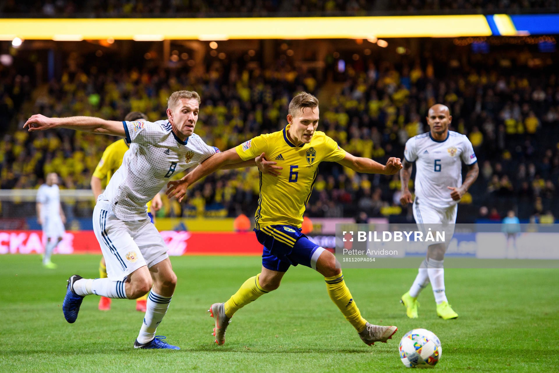 Iury Gazinsky of Russia and Ludwig Augustinsson of Sweden during the Nations League football match between Sweden and Russia on November 20, 2018 in Stockholm.