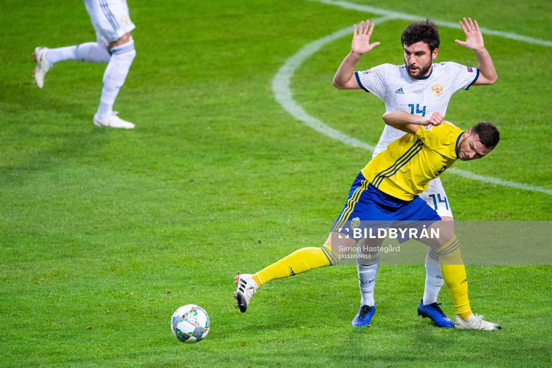 Marcus Berg of Sweden and Giorgi Dzhikiya of Russia