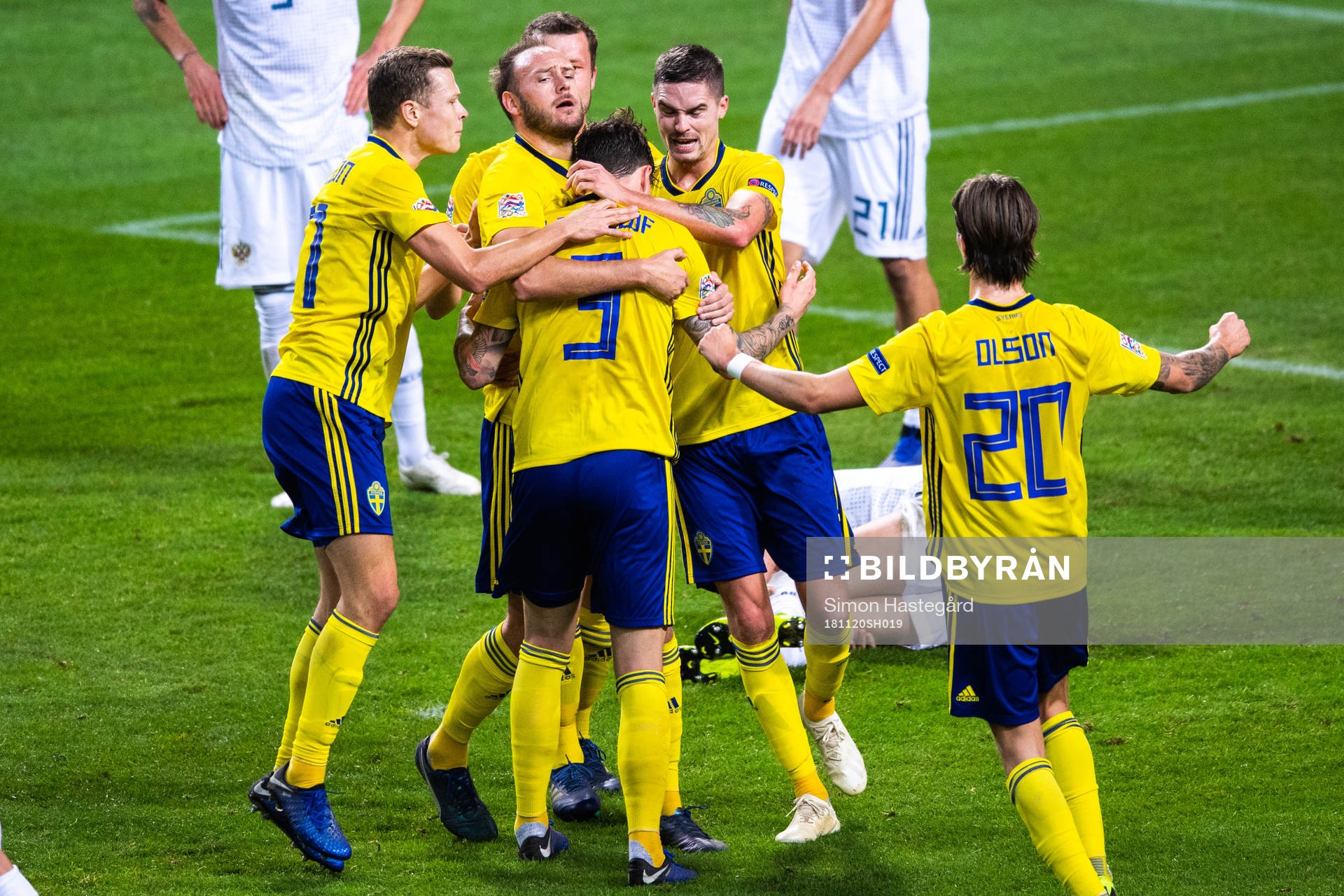 Andreas Granqvist and Mikael Lustig celebrates with Victor