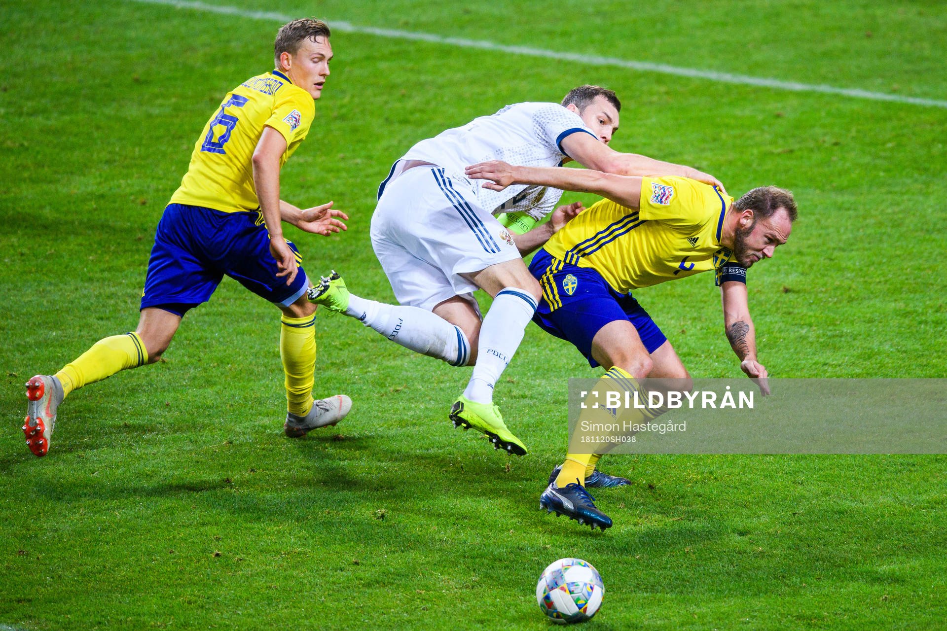 Ludwig Augustinsson and Andreas Granqvist of Sweden in a
