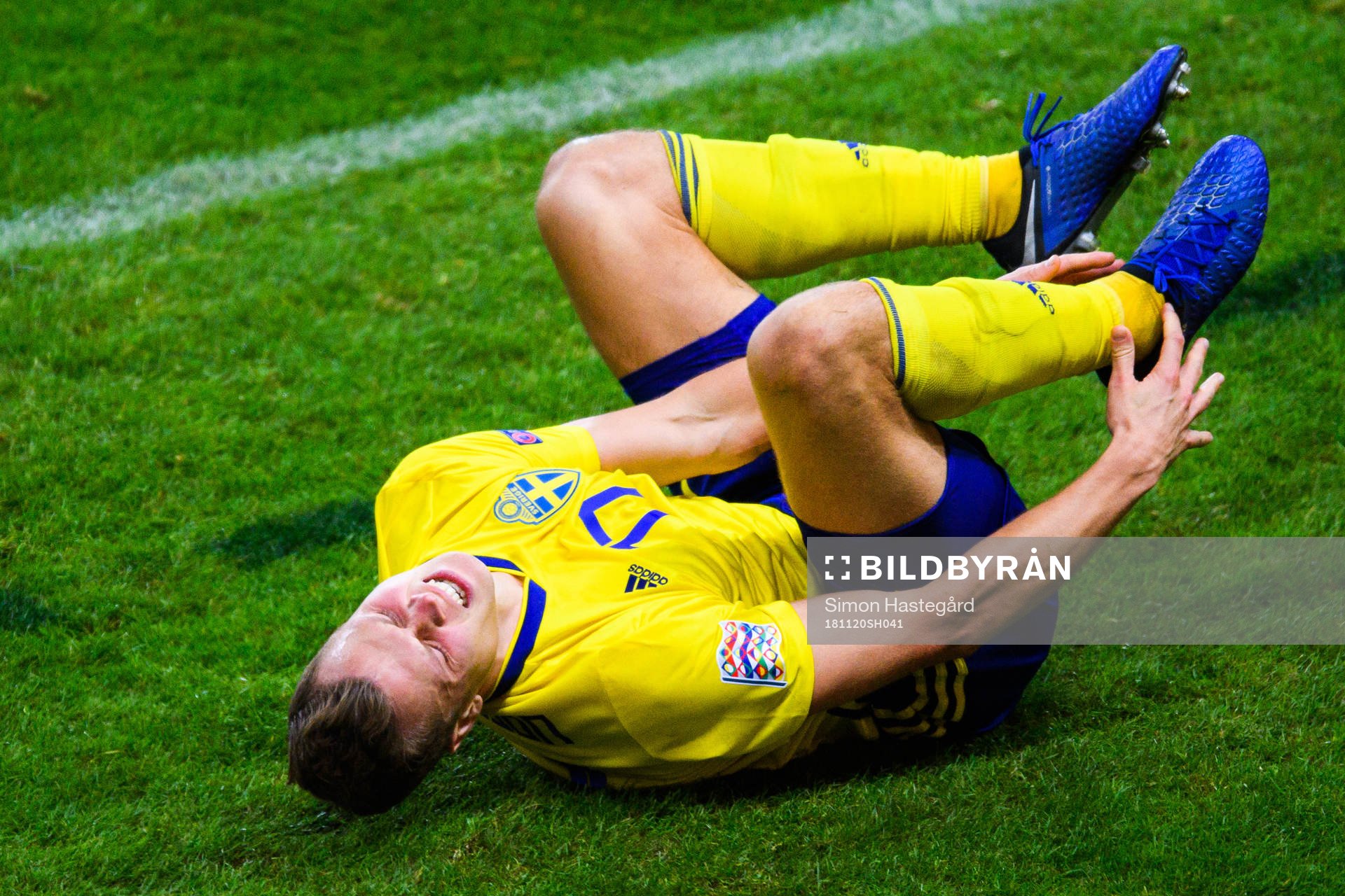 Viktor Claesson of Sweden in pain